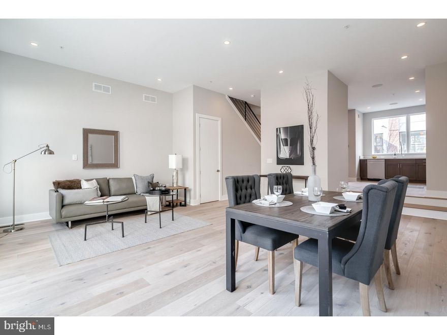 Introducing Le 23... new construction near Rittenhouse Square with elevators, roof decks, 2-car parking and tax abatement!! Sitting just above Rittenhouse square in the Logan square section of center city. located in the Albert M. Greenfield school catchment and just a few blocks to the Comcast centers. 22 foot wide! Le 23 are huge and beautiful homes that have enormous windows that drench the floor plan in natural light. Elegant finishes throughout including subzero, Bosch and wolf appliances, enormous granite kitchen, amazing bathrooms with double vanities and glass showers, wide plank hard wood floors throughout and designer fixtures.High efficiency heating and air. The master suite is spacious and private. The views are exceptional. truly one of a kind. walk to Rittenhouse square, Comcast center, 30th street station, Schuylkill river banks trail, Ben Franklin parkway, the Barnes museum and much more. completion September 2017. Still time to customize SOME finishes. Sheetrock and tile has been installed.walk the building. meet the builder. See attached brochure. Tax abatement pending. pictures are of the builders similar project/home