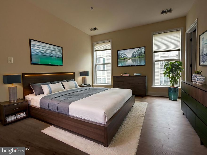 Bright & Spacious 2BR/2BA Condo in Highly Desirable King Farm

Discover comfort and convenience in this well-maintained 2-bedroom, 2-bath home located in the sought-after King Farm community of Rockville, MD. This inviting residence features a generous open-concept living and dining area, perfect for both relaxing and entertaining. The kitchen offers abundant cabinet and counter space, making meal prep a breeze.  Pets permitted on a case by case basis.  Breed and size restrictions.

The primary bedroom has its own private en-suite bath, while the second bedroom is spacious and located next to the second full bath—ideal for guests, a home office, or shared living arrangements. Dogs of most breeds acceptable up to 30 pounds.

Additional conveniences include in-unit laundry and access to all the exceptional King Farm amenities: a community pool, fully equipped fitness center, multiple playgrounds, scenic walking trails, and a free community shuttle to the Shady Grove Metro for easy commuting. The neighborhood is highly walkable, with shopping, dining, and parks just steps away.

Property Highlights:
2 spacious bedrooms, 2 full baths
Open-concept living & dining area
In-unit washer/dryer
Pool, gym, trails, and playgrounds
Shuttle to Metro and walkable to shops, dining, and parks

Professional cleaning still in progress -  Some painting too.

A fantastic opportunity to live in one of Rockville’s most vibrant, amenity-rich communities.