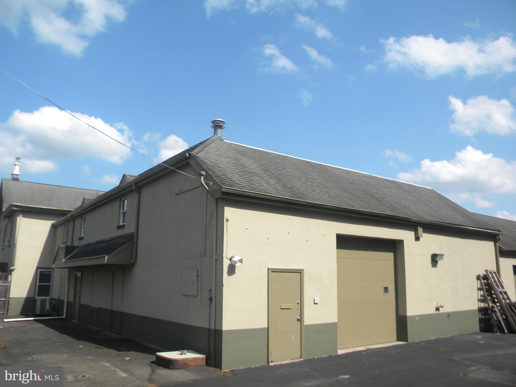 Prime warehouse space for Contractor business with second floor office and ample storage.
Conveniently located near Pa Turnpike, #309, & Blue Route, this masonry 2-story space was formally occupied by a painting contractor. The first-floor warehouse space has a tall drive-in garage door and access to a spacious basement. The second floor has loft space above warehouse and a set of office rooms. Suitable for various types of business in accordance with Whitemarsh Township's "Village Commercial #3" zoning district. Proximity to Flourtown's vibrant business district offers possible specialty retail use. A set of outdoor storage sheds also available.