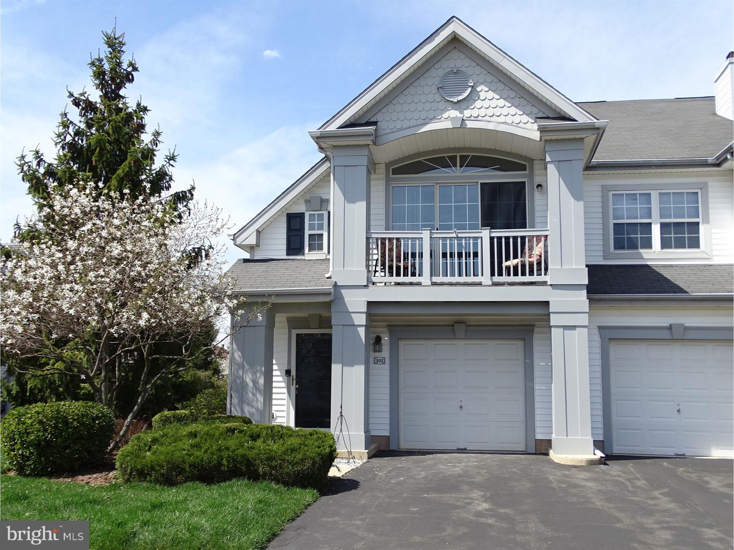 Stunningly updated 2nd floor condo in sought after Country Crossing. This open concept features a great room with a cathedral ceiling and gas fireplace encompassing the family room, kitchen and breakfast room. You'll love the just finished modern grey cabinets with a coordinating back-splash surrounded by Granite counter tops. The brand new hardwood flooring through out the main living space is just divine. A newer stove and new dishwasher and refrigerator enhance the kitchen along with a built in microwave. The great room opens to a balcony in which to sit and enjoy your morning coffee. A large master bedroom has a walk in closet and a full newly renovated master bath also with a granite counter top on the vanity. There is also a well sized 2nd bedroom and full hall bath. The steps have new Berber carpeting. Enjoy the convenience of your one car attached garage. Full size stackables included. This ready to move in condo has your name on it.