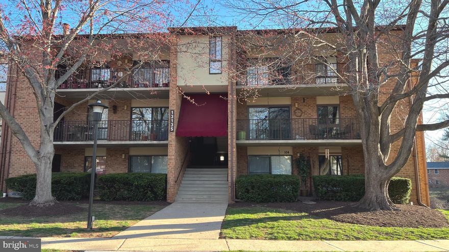 Welcome to this beautiful and ready to move in condo with 1 bed, 1 bath and a den.  This beautiful condo is in a private section that only has 4 units.  It is painted, with new carpet, updated floor, fridge, stove, microwave, and dishwasher (stainless steel appliances) and Granite countertop.  The condo has a reserve parking spot with plenty of street parking.  Upon entering the unit, you will be captivated by the open-concept living room and dining room combination with updated floor.  The living room walks out to the deck area that is bathed in natural light and the beautiful view of the peaceful trees.  The deck is large enough for chair and table.  The kitchen boasts stainless steel appliances, with plenty of kitchen cabinets and ample counter space with new Granite countertop, for making meal preparation and a have a great conversation.  There is a space is the kitchen for table and chairs.  The den is also located off the kitchen that could be used for office space.  The sun soaked; open floor plan offers plenty of living space. The primary suite features a walk-in closet, a closet, and a full private sink. There are a regular size washer/dryer in the unit for your convenient.  The HVAC unit is about 3 years old. The great community has a swimming pool.   It is located near shopping centers, Starbucks, Giant and so much more. Montgomery College Germantown Campus is just minutes away also.  It offers the perfect blend of location, functionality, and sophistication. Welcome Home!