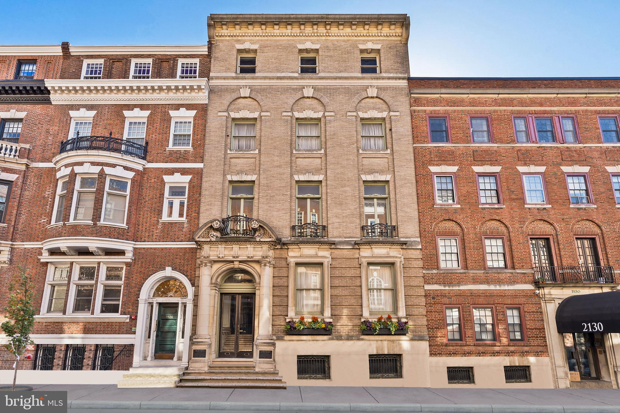 Discover a world of timeless elegance and luxury at 2128 Locust Street, a distinguished Beaux Arts-style residence that exudes Upper East Side townhouse vibes in the heart of Philadelphia's Rittenhouse Square. This extraordinary property offers over 10,703 square feet of refined living space, with a flexible floor plan that seamlessly blends formal entertaining areas with comfortable living spaces.
Designed in 1898 by the esteemed architectural duo Kennedy & Kelsey for the notable Philadelphian Jay Cooke III, this historic gem later served as the Italian Consulate. The home's exquisite craftsmanship is evident in every detail, from the herringbone-pattern wood floors to the ornate crown moldings that adorn the soaring 14-foot ceilings.
As you enter through the impressive double doors, you are greeted by a grand reception hall complete with a musician's alcove and a striking fireplace adjacent to the formal parlor. Make your way up the grand staircase that leads to an open kitchen that flows conveniently into the expansive dining room which features two sets of windows that open to Juliette balconies, complete with interior window shutters. The property boasts a wealth of original features, including stunning stained and leaded glass windows that infuse the space with colorful light.
Currently offering four bedrooms and four bathrooms, this home provides a versatile layout that suits a variety of lifestyles. The fourth floor features three additional bedrooms and three additional bathrooms, which are framed and ready for completion, allowing for expansion and customization. Additionally, the property comes with approved plans for the development of five condos or apartments, presenting a remarkable opportunity for developers to maximize its potential.
The partially finished basement features a wood-burning stove and presents the potential for a billiards room, adding to the home's appeal for those seeking additional recreational space.
The residence is equipped with modern comforts such as central air conditioning and a heat pump, ensuring year-round comfort. The semi-finished attic and basement offer endless possibilities for customization, whether you envision a potential billiards room or additional living quarters. The home is situated on a 3,200 square foot lot (32x100), providing ample space for your urban oasis.
Located just two blocks from Rittenhouse Square Park, this residence combines historic charm with modern amenities, offering a rare opportunity to own a piece of Philadelphia's storied past. Don't miss your chance to experience the perfect blend of luxury and history at 2128 Locust Street.