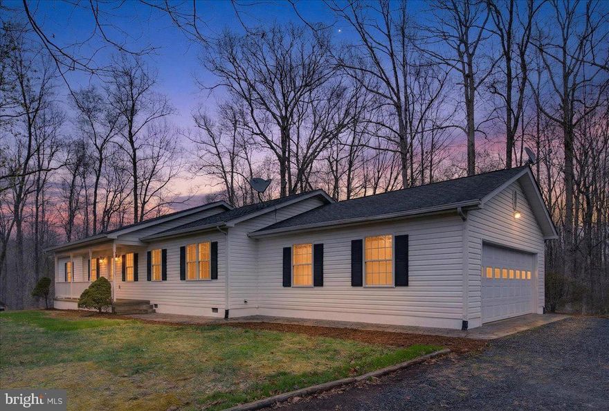 Secluded, peaceful, and packed with upgrades—this 5.51-acre Rhoadesville retreat offers the space, setting, and lifestyle buyers are searching for. Just 10 minutes to Locust Grove shopping, dining, and essentials.
Inside, the home offers a well-designed layout with 3 bedrooms and 2 full baths, including a main-level primary suite. The living areas connect easily to a spacious kitchen with stainless steel appliances, providing a practical setup for daily living and gatherings.
The property offers multiple outdoor and indoor living spaces, including a back deck, a covered front porch, a sunroom for year-round use, and a stamped concrete patio—ideal for relaxing or entertaining. Soapstone Branch Creek runs through the property, adding to the serene setting.
Recent upgrades offer added peace of mind, including a new heat pump, water heater, and whole-house water filtration system—plus additional improvements throughout. Additional highlights include:
Cozy fireplace in the family room, attached 2-car garage + separate shop for hobbies or storage, stamped concrete walkway, and private, wooded lot ideal for those seeking space and seclusion

Opportunities like this don’t come around often—schedule your private tour before it’s gone.