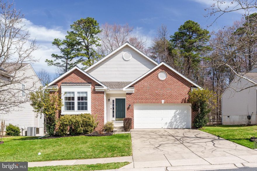 There’s no place like home! Enjoy easy living in the highly sought after Patriots Glen community! This move-in-ready home offers the ease of one-level living with amenities to enhance your lifestyle. The community boasts a clubhouse, pool (and kiddie pool), grills, fitness area, tennis courts, restaurant, and tavern. Golf lovers can join the golf course and try out the anticipated driving range. Inside the home, find an open layout with beautiful hardwood floors. The family room, featuring vaulted ceilings and a gas fireplace, connects to the dining area and spacious kitchen with ample cabinet space and a sliding glass door to the back deck. The main level features three bedrooms, including a large owner's suite with a walk-in closet and private bathroom with dual sinks. A two-car garage and a main level laundry room add convenience. The unfinished basement provides a bath rough-in and plenty of space to finish for additional living space. Close to major commuter routes, the MD/DE state line, I-95, Rt 40, shopping and dining. Call for your showing today!