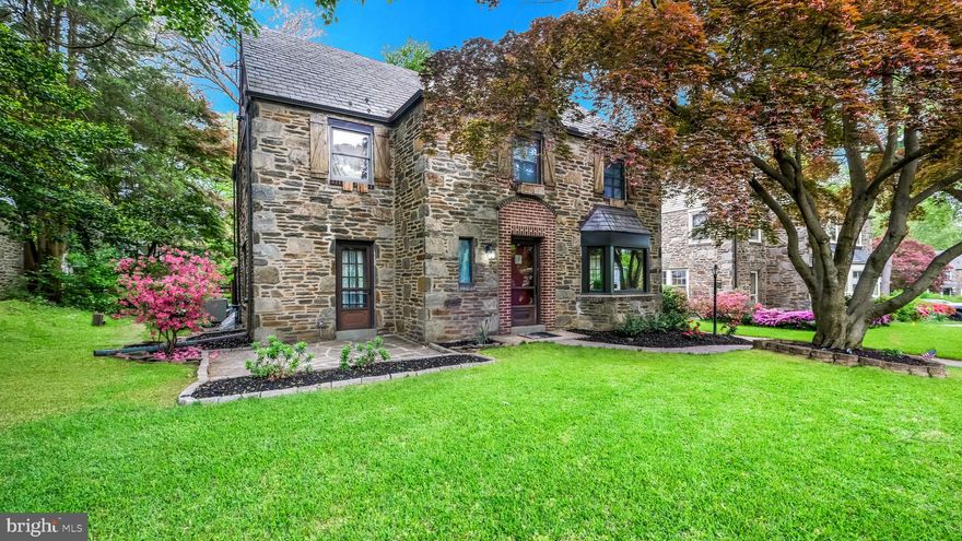 Looking for a home with character?  Welcome home to your new 3BR/3.5 bath Gorgeous Stone Center Hall Colonial. Step inside where you are greeted by hardwood floors that extend into the oversized dining room. The dining room is illuminated by the beautiful bow window overlooking the front yard.   To your left is the living room with built ins, and a wood-burning fireplace ideal for those cold evenings.  Just off the living room is the door that leads to the charming front patio.   The Eat-in Kitchen is flooded with natural light and has a phenomenal view from a huge picture window overlooking the back yard. 
A long expanse of granite counters coupled with stainless steel appliances make this kitchen pop. On the back of the home is the converted garage which is ideal for a home office or a playroom with loft storage and separate zoned electric heat.  Finishing off the First floor is the updated powder room. On the second floor are 3 good sized bedrooms each with its own walk-in closet, a full hallway bath, a cedar closet and a large master bedroom with a walk-in closet and an ensuite master bath. The basement has been finished and is sure to please with a full bathroom, room that could be used as a bedroom, laundry room, family room and wet bar.  Let the backyard be your oasis with a multilevel paver patio and pergola.  Just imagine sitting outside in your new home, relaxing after work.   The house is set on a pretty tree-lined street and has a lovely, level backyard. Charming features include: hardwood floors, slate roof,  and curved entryways. It is centrally located: 5 minute walk to Melrose Park train station or a 10 minute drive to Abington Hospital.
