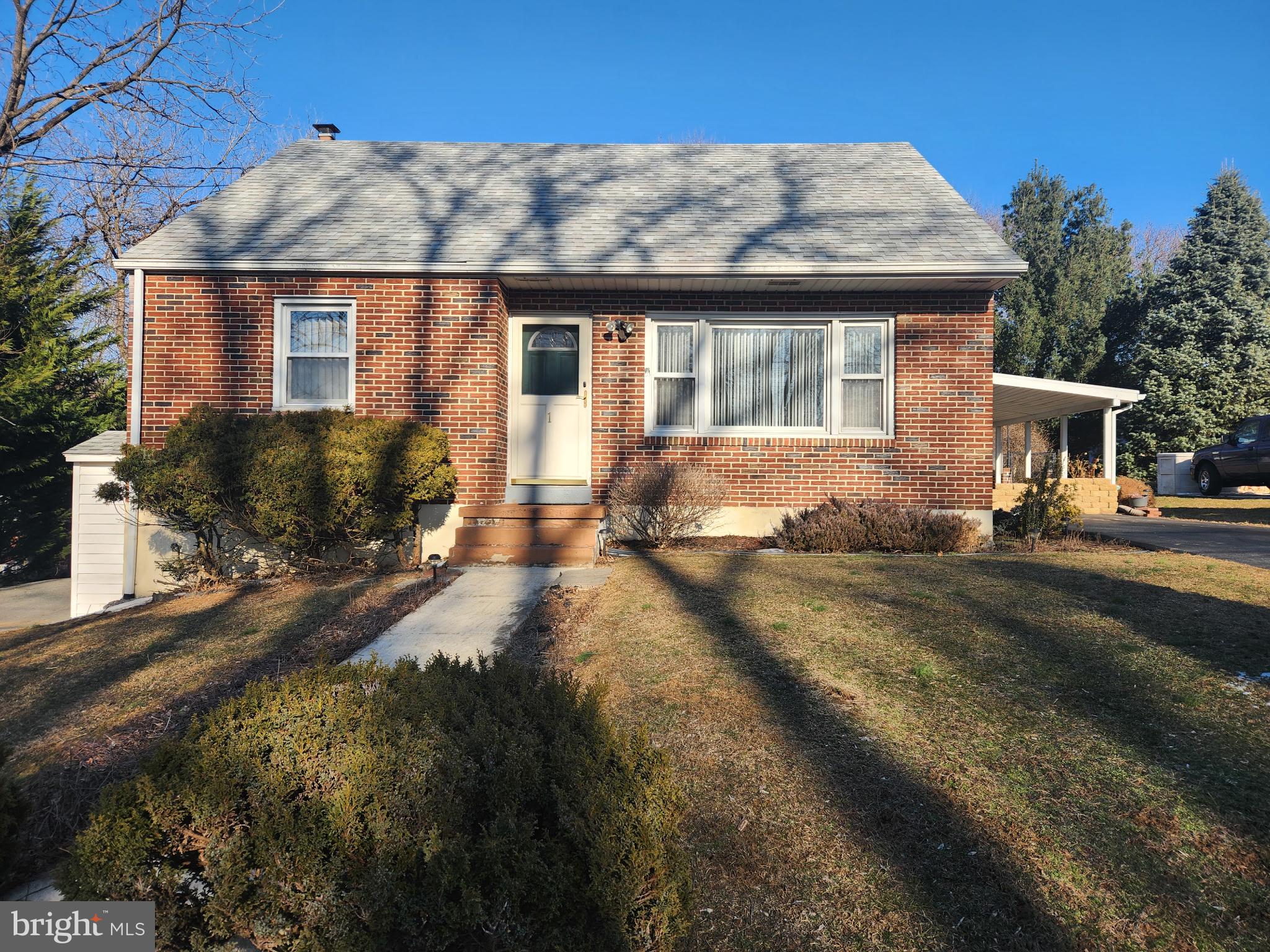 This property will be offered at Public Auction on Saturday, April 12, 2025 @ 10am. The listing price is the opening bid only and in no way reflects the final sale price. 10% down due at auction, 2% transfer tax to be paid by the purchaser, real estate taxes prorated. This brick home, nestled in a small neighborhood, offers convenient access to Routes 322 and 422. The main level features a cozy family room, a generous eat-in kitchen, a full bathroom, a bedroom, and a spacious sun porch with laundry hookup—perfect for relaxing or entertaining. Upstairs, you’ll find an additional two bedrooms. The partially finished basement offers a family room, a powder room, laundry hookups, and mechanicals. Outside, enjoy a large fenced backyard with ample space for outdoor activities, an attached carport, two storage sheds, and an all-weather deck.