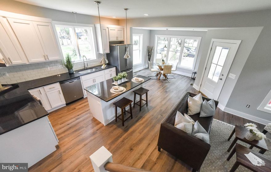 QUAINT.TOTALLY CUSTOM HOME. Buried Electrical Service and Internet Cable, Nitrogen Septic System, New Deep Well, Fire Sprinkler System, Spray Foam Insulation. Entire First Floor Flooring is Waterproof, Zero Entry Shower in MB, Ceramic Title in MB and 2nd Floor baths, Granite Counters with Kitchen's solid wood trim. Propane tankless water heater,solid custom 2 panel wood doors, and MORE