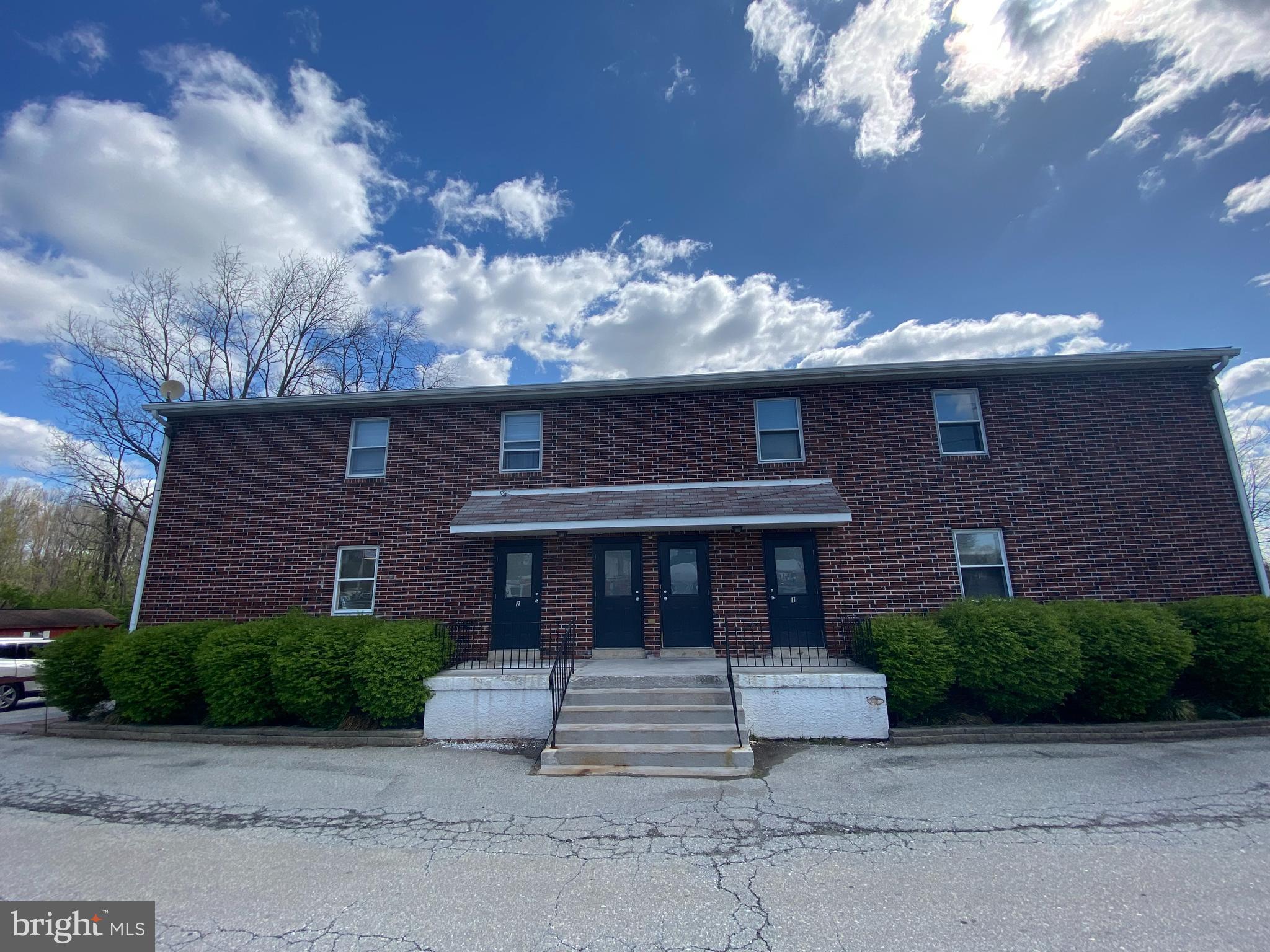 This highly visible 1200 sq/ft office space is available immediately. There is a common hallway with 2 bathrooms that is shared with the company that performs the property management of this building. There are 4 residential units above on the second floor. Potential for a subdivision of the office space can be discussed. The tenant is responsible for 30% of the cost of snow removal. Potential for storage in the 3 oversized sheds if needed; can be discussed with the landlord. Items in photos are temporarily stored and will be removed shortly.