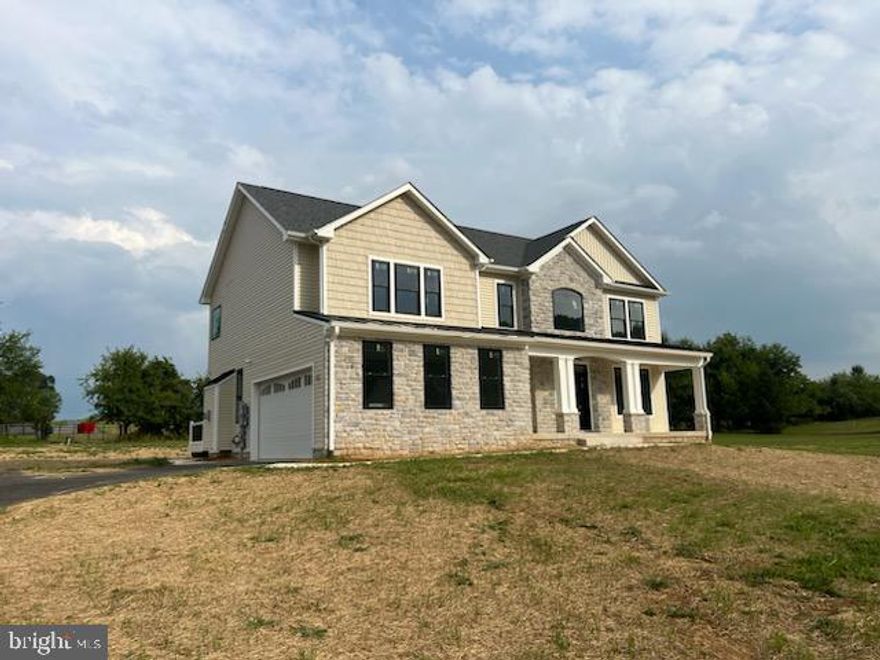 Beautiful finishes in this new construction.  Quality materials throughout.  LVP flooring throughout the main level. Gas fireplace in the family room with stone surround and mantel.   Open living concept.  Morning room with access to composite decking.  Polished Quartz countertops in the kitchen along with stainless appliances, soft closing cabinet and drawers, 2 tone cabinets, tiled backsplash.  White oak staircase.  All baths including half bath have tiled flooring.  Primary bath has free standing tub, glass enclosed oversized shower, double bowl sinks.  Large primary bedroom with cathedral ceilings, huge walk in closet with window, LVP flooring.  The basement is mostly finished with lvp flooring on floors and stairs.  Daylight with 2 large windows and a walk up exit.  Water softener installed along with a tankless water heater.  Exterior is finished with black framed windows, huge columns on stone bases and much more.  Delivery in August 2024.