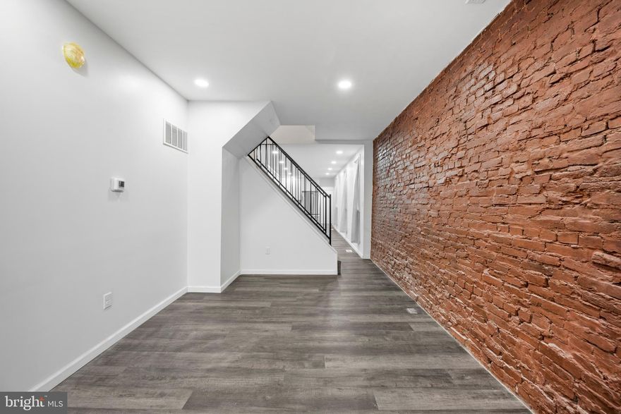 Welcome to 2011 N Pulaski St, Baltimore, MD—a beautifully renovated home offering the perfect blend of modern updates and classic charm. This spacious property features four generously sized bedrooms and 2.5 bathrooms, providing plenty of room for comfortable living.
Step inside to discover a thoughtfully updated interior, including a stylish kitchen with contemporary finishes, upgraded flooring throughout, and refreshed bathrooms designed with both function and elegance in mind. The open layout creates a seamless flow between living and dining spaces, ideal for everyday living and entertaining. Upstairs, you’ll find well-appointed bedrooms with ample closet space, while the primary suite offers a private retreat. The additional bathrooms have been fully modernized, ensuring convenience for family and guests alike.
This move-in-ready home is perfect for buyers seeking space, style, and value. Conveniently located near major commuter routes, shopping, and local amenities, this property is a must-see.