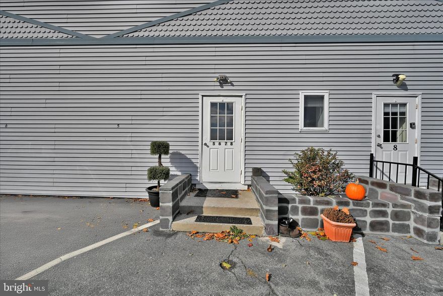 Welcome to this bright and inviting 2- bedroom, 1 bathroom condo that’s been beautifully refreshed top to bottom! Step inside to discover new flooring throughout and fresh paint in every room, creating a clean and modern feel. The spacious living room features vaulted ceilings, adding an open, airy atmosphere that’s perfect for relaxing and entertaining. The kitchen has been tastefully updated with new flooring and fresh paint, featuring a spacious area for a table, dishwasher, and garbage disposal. Both bedrooms offer comfortable new flooring and plenty of natural light. This bathroom has been stylishly updated with new paint, flooring, and vanity. On site laundry room with washer and dryer. This condo is truly move-in-ready freshly painted, beautifully updated, and full of charm. Don’t miss your chance to make this stylish home your own!