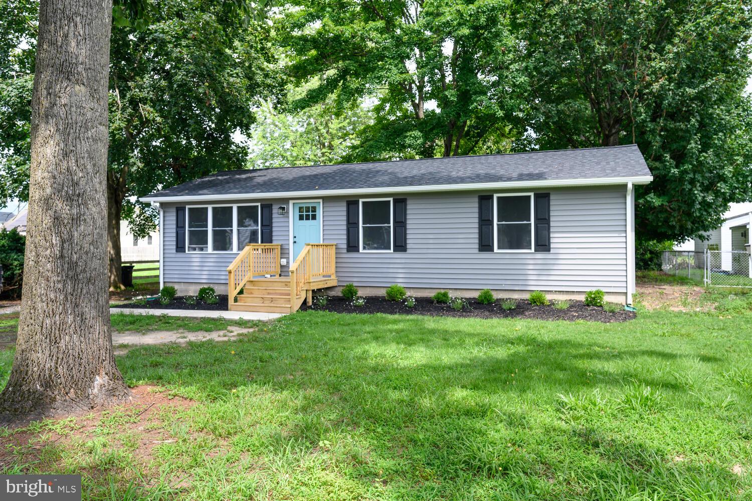 Fully Renovated Rancher with a bonus shed fitted out with electric and drywall!
Welcome to this beautifully remodeled 3-bedroom, 1-bath ranch-style home in the heart of Ridgely, Maryland. Every inch of this home has been thoughtfully updated—featuring a brand new roof, siding, energy-efficient windows, and new front and back doors for enhanced curb appeal and peace of mind.
Step inside to find all-new drywall, trim, interior doors, and updated light fixtures throughout. The kitchen and bathroom shine with brand new cabinets, countertops, and modern appliances, while new flooring ties the space together with a clean, contemporary feel. Enjoy the outdoors on your brand new rear deck, perfect for relaxing or entertaining.
This move-in ready home offers small-town charm with modern updates. Schedule your tour today!