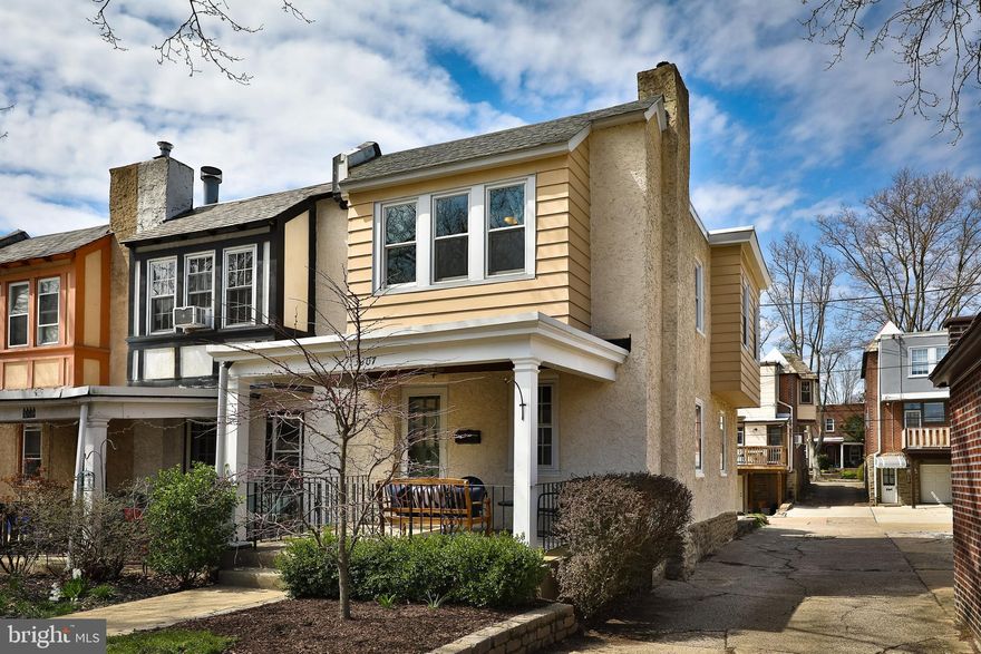 Welcome to 3307 Ainslie Street. A wonderful end of row home in the very popular East Falls section of Philadelphia. This beautiful, move-in ready three-bedroom, one bath home is situated on a beautiful tree-lined street, only blocks from neighborhood markets, schools and public transportation. From the moment you approach the front door you will fall in love with the large, covered porch where you can enjoy morning coffee or relax at the end of the day. Enter into the living room with bamboo hardwood floors that continue through to the dining area filled with natural light making the home nice and bright.  The dining room offers a desk area to collect your mail and packages along with built in cabinets for storage and a bench area for additional seating. This opens to an updated kitchen hosting island seating, gorgeous quartz counters, tile backsplash and wooden cabinets. The back door leads to a pantry area that opens to a large deck that is ready for hosting barbeques and simple basking in the sun. The first-floor layout makes it easy to entertain family and friends. On the second floor you'll find three bedrooms and one bath. There are hardwood floors throughout the second floor.  The master bedroom has exceptional light from the large windows. The basement has been well maintained and has so much potential for use! Could be finished as a home gym, toy/play area or add some shelving and use for storage and the laundry is also located on this floor. The basement walks out to the rear alley where there is off-street parking. Located close to Kelly Drive, Philadelphia University, PCOM and the Wissahickon Trails. Easy Access to Center City Philadelphia, the King of Prussia Mall and only a 6-minute walk to the East Falls Train Station.