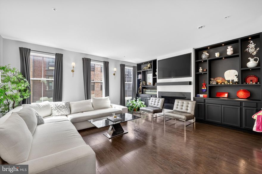 Welcome to 506 Riversail Lane, a meticulously maintained and like-new end-unit townhome built in 2020, ideally situated within the gated Potomac Overlook community at National Harbor. The home features a premium lot on Monument Row, one of the very few rows where the Washington Monument is visible from the second, third, and fourth floors. Offering 3,535 square feet of thoughtfully designed living space across four luxurious levels, this stunning home features four spacious bedrooms, three full and two half bathrooms, and a rooftop terrace with incredible views that stretch from National Harbor to Alexandria, Virginia and all the way to the iconic skyline of downtown Washington, D.C.

From the moment you step inside, you will appreciate the attention to detail—from stunning custom cabinetry throughout the first and second floors, to the gleaming hardwoods, elegant crown molding, and natural light that pours through oversized windows. The open-concept main level is anchored by a gourmet kitchen, beautifully appointed with granite countertops, a large center island, stainless steel appliances, abundant cabinetry, and gas fireplace with LED lighting —perfect for hosting or everyday living. The spacious dining and living areas flow seamlessly, creating a warm and inviting atmosphere.

Each of the four bedrooms includes a private en-suite bathroom, ideal for both comfort and privacy. The expansive primary suite offers dual walk-in closets and a spa-inspired bath complete with double vanities and a spacious glass shower. A stylish half bath on the main living level and a flexible work from home spaces add to its versatility.

The crowning feature of this home is the rooftop terrace—an exceptional outdoor retreat with a second gas fireplace and sweeping views to the north. Whether entertaining guests or enjoying a quiet evening, this space offers a rare combination of privacy and visual splendor. A wet bar complete with beverage refrigerator make indoor/outdoor living a breeze.

Additional highlights include a two-car attached garage with Universal Level 2 Tesla EV charger, heated and cooled garage, upper-level laundry, recessed lighting, smart home technology including a new Samsung tv in the family room conveys, central vacuum, and low-maintenance living within a secure, beautifully maintained community. Just steps from the vibrant dining, shopping, entertainment, and waterfront attractions of National Harbor, this home places you at the center of it all while offering a peaceful retreat above it.

506 Riversail Lane isn’t just a home—it’s a lifestyle defined by luxury, location, and extraordinary views.