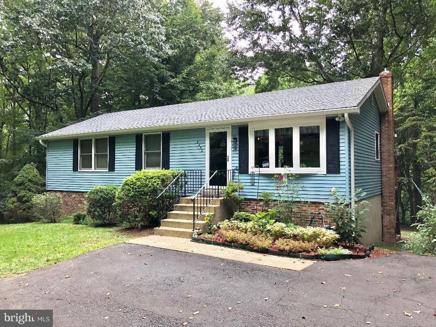 All New Carpets and Main Level just painted.   Granite counters * Updated Kitchen & Bathrooms. Features Include: 4 Bedrooms * BRIGHT  KITCHEN & Bathrooms * Deck * Pool * You want PRIVACY - but still be part of a FANTASTIC NEIGHBORHOOD - Here you have a Private Yard and Setting * and a GREAT neighborhood location!!  Finished Lower Level with Newer Pellet Stove 2017 *  4th BR in Lower Level, Plus additional room that can be an office or storage!  * Short drive to the Chesapeake Bay!! Enjoy all that Bay living has to offer & NO town taxes! Close to Restaurants / Marinas / Shopping /Public Beaches and 3 Boardwalks / Water Park /Resort and Spa / Slots - the list goes on!  * The Twin Beaches are like a Norman Rockwell Painting and You can Live in it ! 40 minutes to DC, 30 minutes to Joint Base Andrews, 35 minutes to Annapolis and 1 hour to BWI makes this an Extremely Convenient location.  * Neighborhood has bike/walking Paths and Tot Lot * Sport Fields