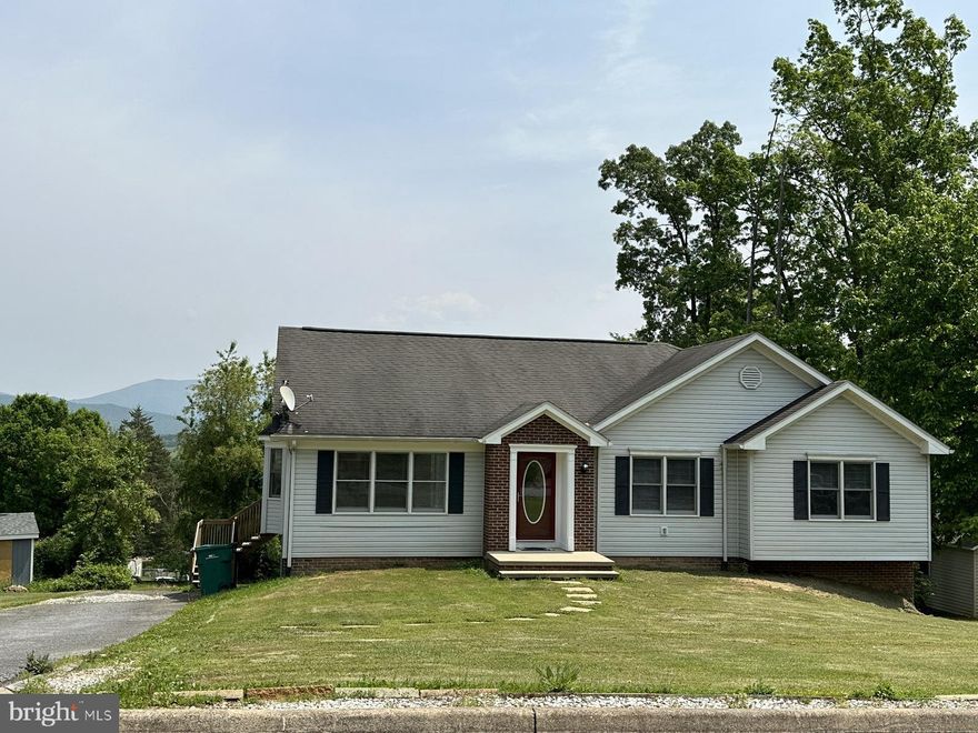 Wonderful Home with views!  This 1440 sq.ft. home with full unfinished basement has had a full face lift and is Move In ready.  Large Living Room with Vaulted ceiling and recessed lighting, formal Dining Room, Kitchen with stainless appliances and Pantry, Primary Bedroom with Bath and 2 Closets including walk-in Closet, 2 additional Bedrooms and Hall Bath.  Large Unfinished Basement and outside there is a large shed.  You will enjoy the fantastic mountain views off the rear deck.