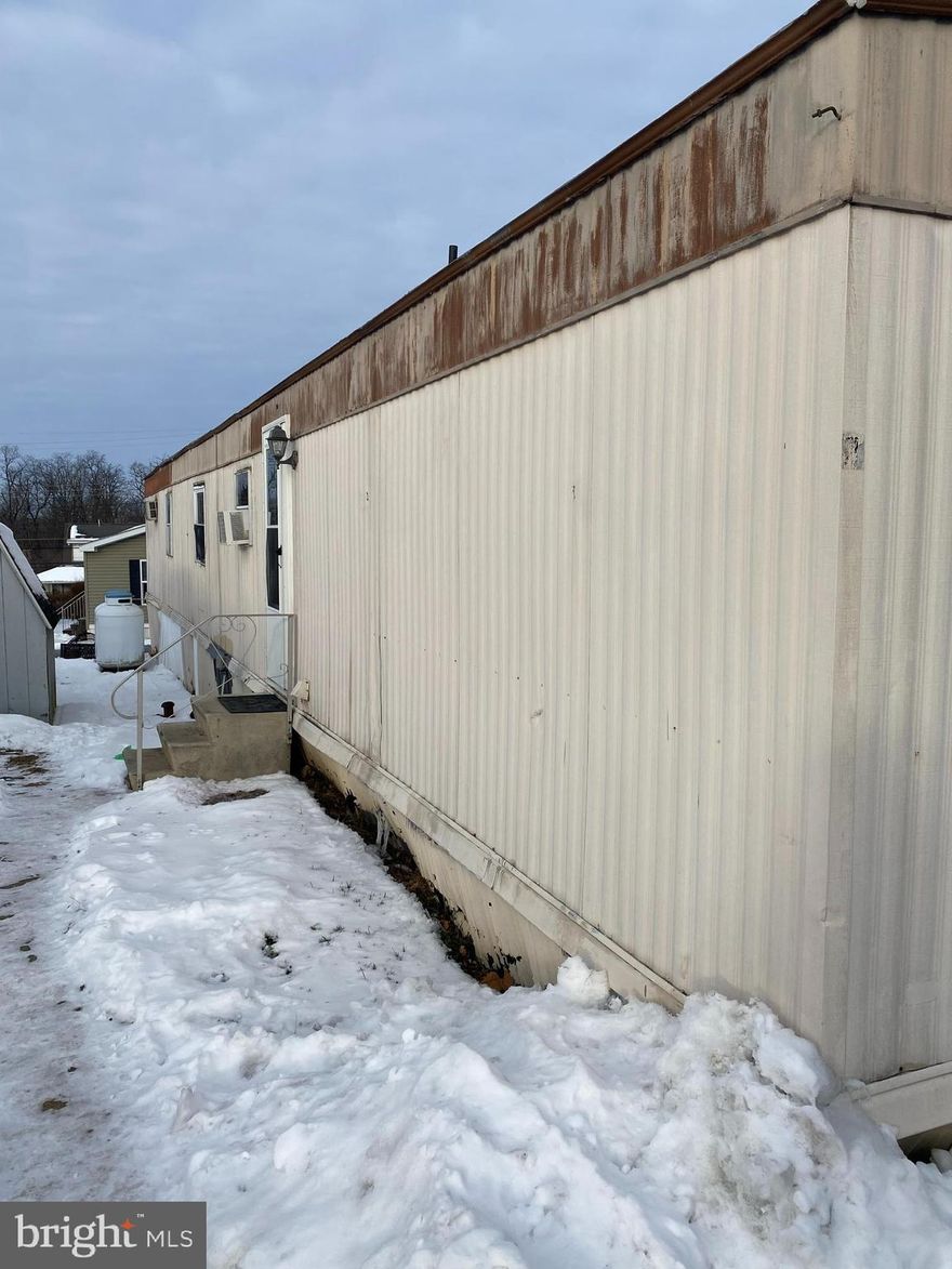 Looking for an affordable home you can make your own? This mobile home is the perfect canvas for your creativity! While it could use a little TLC, it offers plenty of potential to be transformed to your liking.

Located just outside of Lebanon, this property features 2 or could be 3 bedrooms (one bedroom is currently being used as a dining room) and 1 bathroom, and a kitchen ready for your personal touch. On the back side of the home there is a deck for summer entertaining.

With a little elbow grease and vision, this home could shine! Whether you're a first-time buyer, downsizing, or looking for a project, this is a rare chance to own a home at an unbeatable price.

Act fast – affordable opportunities like this don’t last long! Schedule your showing today and see the potential for yourself.