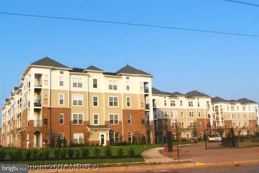 Luxury one bedroom condo with secured garage parking. Best direction facing and view of the entire compound with a lovely balcony. Good size bedroom suite, living-dining combo with hardwood flooring and gas fireplace. Beautiful open style kitchen with breakfast Bar & large cabinets. Secured building with elevator. Great location! Very short distance to shopping centers, such as Costco, Lotte, Walmart and Aldi. Easy access to public transportation such as Dulles international airport and highway Route 50, 28, 66, 267. Minutes of drivings to Steven Udvar-Hazy National Air and Space Museum. On site gym, swimming pool, club house and management office. Vacant & move-in ready. A must-see!