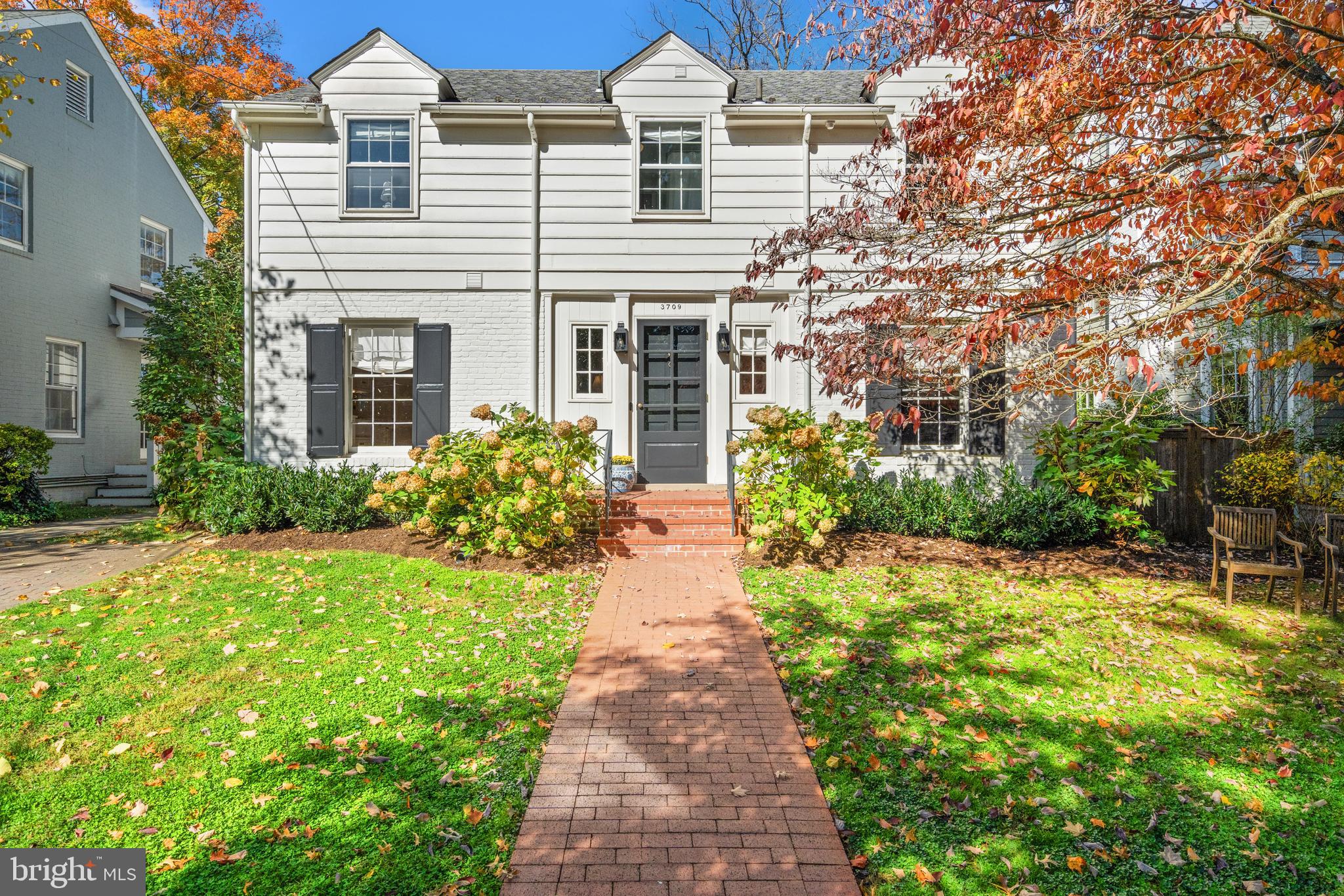 OPEN HOUSE CANCELLED - Welcome to this charming and tasteful home nestled on an idyllic magical street in the heart of Section 5 of the Village of Chevy Chase. Meticulously renovated in 2020 by Acadia Contractors Inc., this residence exudes elegance and sophistication. The quality and design details of the full gut renovation feature high-end finishes including, brand new moldings, custom doors, designer window treatments, fitted wool rugs, refinished solid hardwood floors and more. From the moment you step into the gracious foyer, you will notice the exquisite details that set this home apart.
The first floor boasts a beautifully renovated kitchen, complete with custom soft-close cabinetry with deep cabinets and pull-out pantry storage, honed marble countertops, a custom-paneled Sub-Zero refrigerator/freezer, a Thermador 5-burner range with a Zephyr range hood, a Thermador dishwasher, and a classic porcelain farmhouse sink. E.R. Butler & Co. nostalgic hardware in nickel and solid unlacquered brass is found throughout the home, adding a refined touch to every space. The adjacent dining room leads to a large screened-in porch, perfect for enjoying quiet mornings or hosting guests.
The spacious living room features a newly lined wood-burning fireplace, expanded room openings, new recessed lighting, new moldings and large picture window. Enter through a new opening with custom glass doors into the library. The whimsical powder room with Brunschwig wallpaper rounds out the first level.
A custom sisal runner leads you upstairs to the second level, where you will find a sought after floorplan offering four generously sized bedrooms which is rare to have in this neighborhood and two full baths. Each bedroom has designer window treatments in cotton or linen. The large vintage hall bath is stunning with beautiful blue wall tiles and new hardware including a favorite Speakman shower head.
The primary bedroom’s new molding was painted in a color original to the home, also featuring a walk-in closet, Schumacher custom linen roman shades and new honed marble bath with herringbone marble bath floor, nickel hardware from Urban Archeology and custom cabinet built-ins.
The impressive lower level offers a versatile walk-out recreation room, an additional bedroom, a new honed marble full bath, and a large functional laundry room with built-ins.
Outside, the fully fenced backyard provides an expansive, private space ideal for outdoor entertaining or quiet relaxation. Both the front and back yards feature all new landscaping. Enjoy the tulips come springtime! Every corner of the home has been carefully updated, from the new electrical and heavy-up and all new gutters completed in 2020 to the custom Roman shades, brass fittings, and elegant sisal and custom fitted rugs. Additional features include brand-new toilets and sinks, updated lighting by Visual Comfort and Cape Cod Lanterns, refinished solid hardwood floors, all new trim, a Nest thermostat and doorbell and more.
This residence has been meticulously cared for and has had only two previous owners.
Set in the highly sought-after Section 5 of Chevy Chase, this home is perfectly situated to enjoy the amenities of a close-knit neighborhood while remaining just a short stroll from La Ferme, Brookville Supermarket, a pharmacy, drycleaner, and more. The home is also within walking distance to two prestigious private country clubs, adding unmatched convenience for recreation. With its close proximity to downtown DC and Bethesda, you will enjoy the best of both worlds: small-town charm with big-city convenience, an exceptional opportunity.
