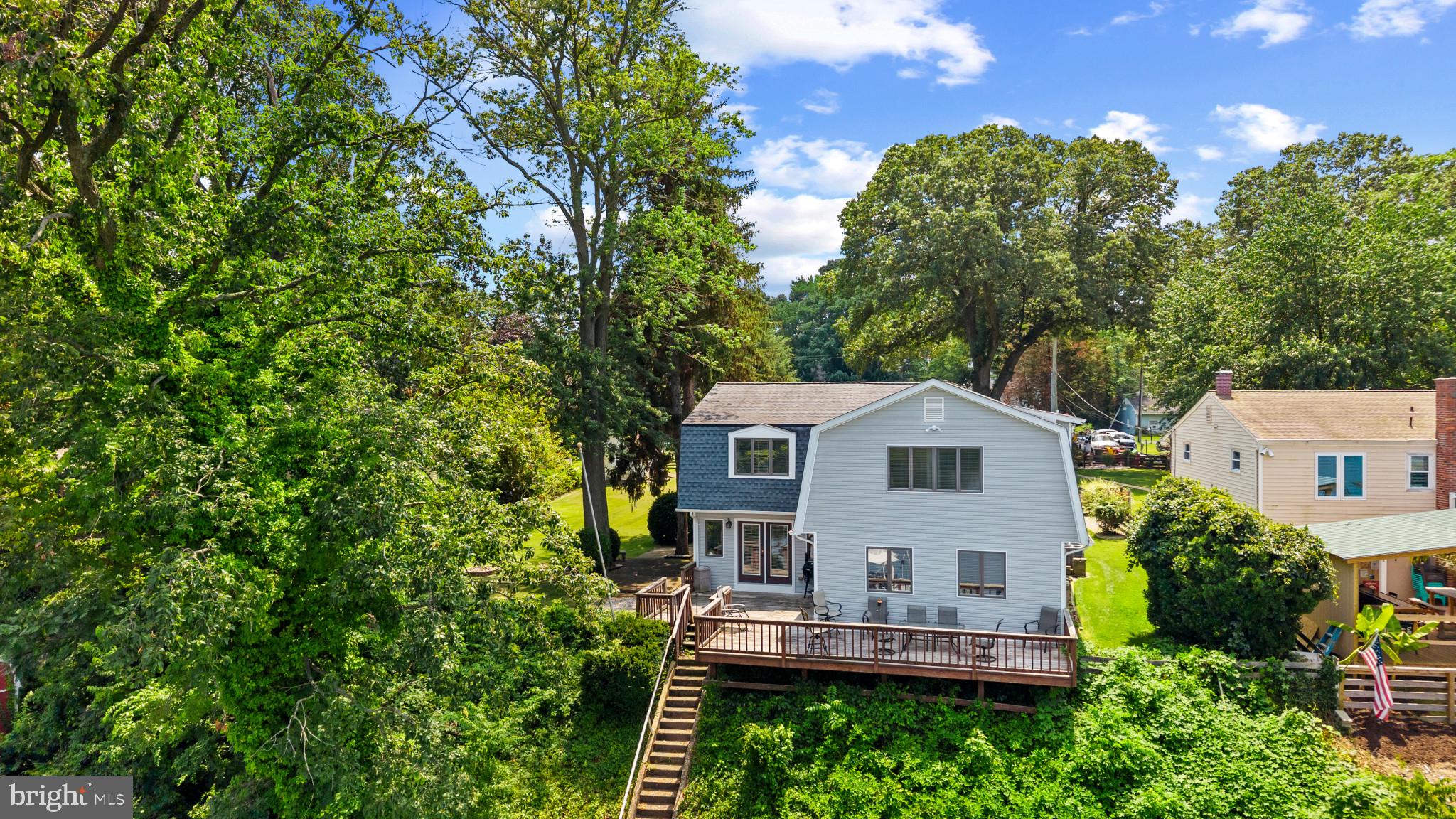 Rare find on this beautiful waterfront home. This home is setting on an extraordinary 100x281 Lot with a potential future building site or plenty of space for a guest home and a detached garage, pole barn or storage. This charmer flows with an open floor plan offering spacious rooms through-out. Home shows very well and offers all the luxuries of fine living. Large Master with full bath / jacuzzi. Home also offers an efficiency living area in lower level. Home has been updated over the years offering newer roof, siding and soffit. Replaced furnaces / dual system and much more. Walk out to the deck and forget about life for a while. Spectacular views with deep water for large boats or sailboat with a maintenance free stone boulder bulkhead. Home has a lot to offer so don't miss out. Seller has found home of choice and can settle quickly.
