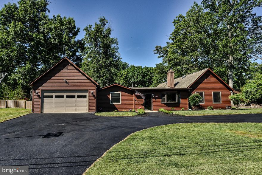 Amazing one level living! Major additions & features to this charming rambler, set in Mason Neck on a quiet cul-de-sac! this gem is nestled on over a half acre of level lot, with half-moon driveway , and over 2450 sq ft of living space. Gleaming hardwood entrance and living room, quartz counters and designer back splash , All SS appliances! Kitchen breakfast area & wood burning fireplace! All utilities are underground service, HUGE family room with hardwood floors, loads of natural light, remodeled hall full-bath, Enormous garage with 15 ft ceiling and space for shop. fits 3 cars and is separately heated & cooled, insulated and a half bath!Fully fenced rear lot, with patio and loads of recreation space. Community set in quiet wooded rea surrounded by state and national parkland. Horse trails, bike jog and natures trails. Minutes from Potomac river boating and water sports. Top school pyramid, minutes to Ft Belvoir, NGA,  VA Rail System to Pentagon and Arlington and DC, 4 minutes to I-95