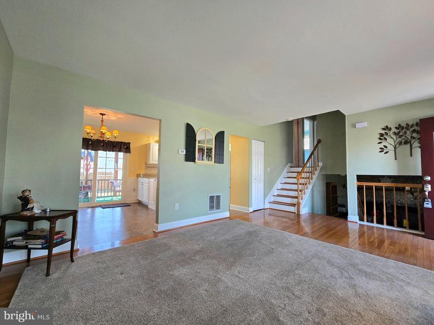 Beautifully maintained split level in water privileged Sunset Beach, Pasadena.
Updated kitchen with granite countertops...walk out to the screened in back porch.  Backyard is surrounded by a 6 foot white vinyl privacy fence, bonus with double gates for convenience.  Extra large driveway allows for at least 8 cars.  
Home offers 4 spacious bedrooms and 2 full baths.  Lower level family room has new flooring, and a stunning full length brick fireplace with built in wood storage. 
Sunset Beach has a voluntary HOA, community park, community beach, community boat ramp for a small fee, community marina for a fee....just in time for the spring/summer activities