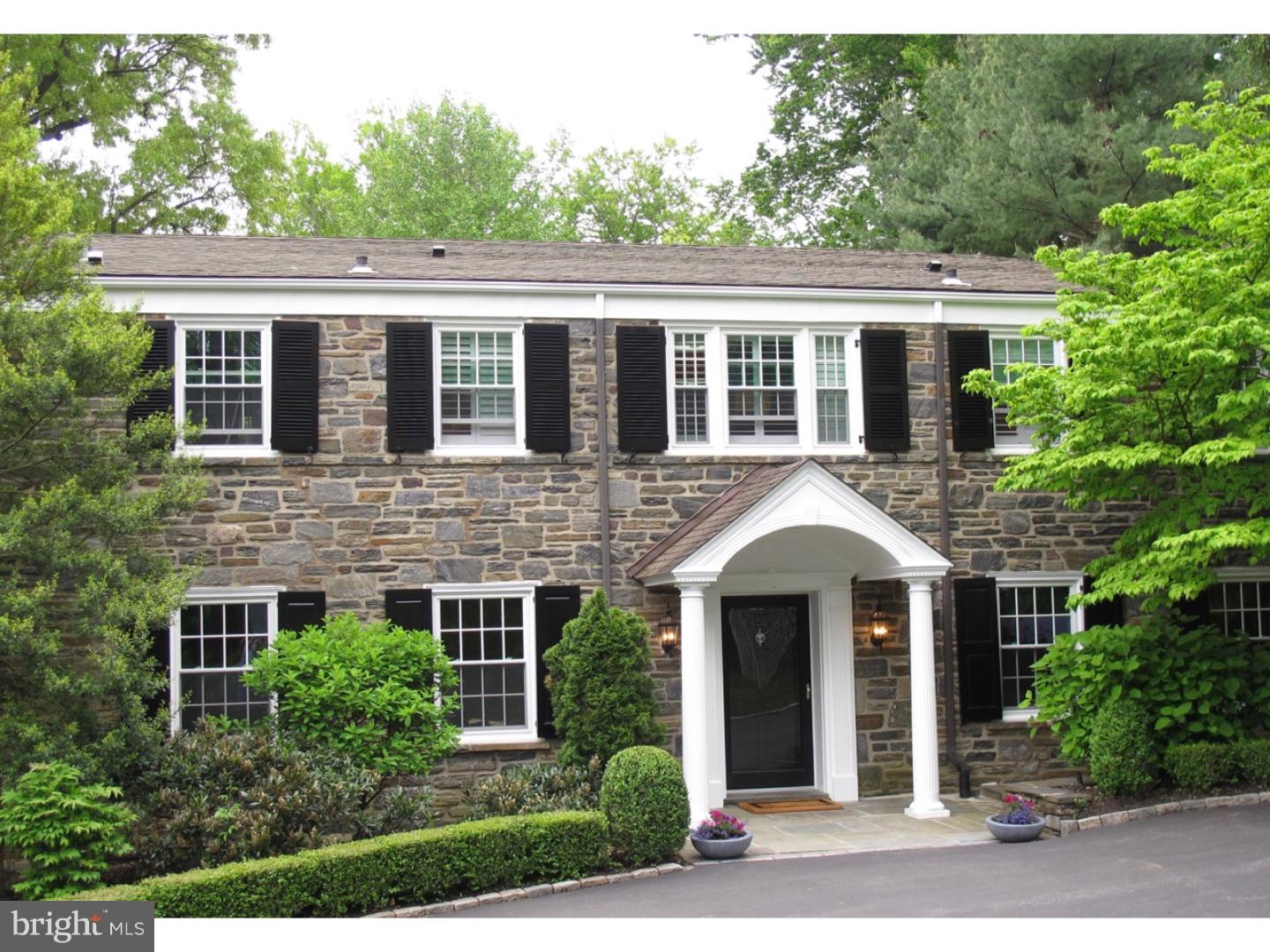 Nothing to do but move in to this stone colonial located on one of the most coveted streets in Lower Merion. Renovated throughout with a contemporary flair this home is truly unique for the Main Line. The custom contemporary kitchen features walnut cabinetry with marble countertops and integrated appliances consisting of two Subzeros, Wolf range, and a wine refrigerator. An open and bright eating area overlooks the tranquil rear yard complete with a heated pool and spa, and lush landscape creating a true private oasis. Off the kitchen is the cozy family room with double sets of french doors leading out to a spacious flagstone patio and pool/spa. There is a lovely formal living room with gas fireplace and a separate office/study with a second marble fireplace (wood burning) and built in bookcases. Plus a spacious dining room for formal entertaining. The back staircase leads to a separate homework/office/prep space which can be concealed from the entry by a pocket door. Upstairs find a lovely master bedroom suite with marble bath, walk in shower, whirlpool tub, and double closets. A second bedroom suite with newly remodeled bath and walk in shower. Third and fourth bedrooms share a newly remodeled bath. The fifth bedroom/au pair suite also has its own new bath and private back stair access. Finished basement ha a spacious sitting area with a stone fireplace and a separate game area plus a 5th full bath which is convenient for the pool. Two laundry rooms (second floor and basement). Wide plank flooring throughout, new windows, 6 panel doors, new custom light fixtures and overhead lighting throughout, 8 zone heat, 3 fireplaces, 3 zone ac, and newer hot water heater (2013), 2 car garage, circular drive and premier Northside Haverford location. Walking distance to train, Suburban Square, shops, and restaurants. Enjoy the best of both suburban and city life-easy 20 minute commute to Philadelphia.