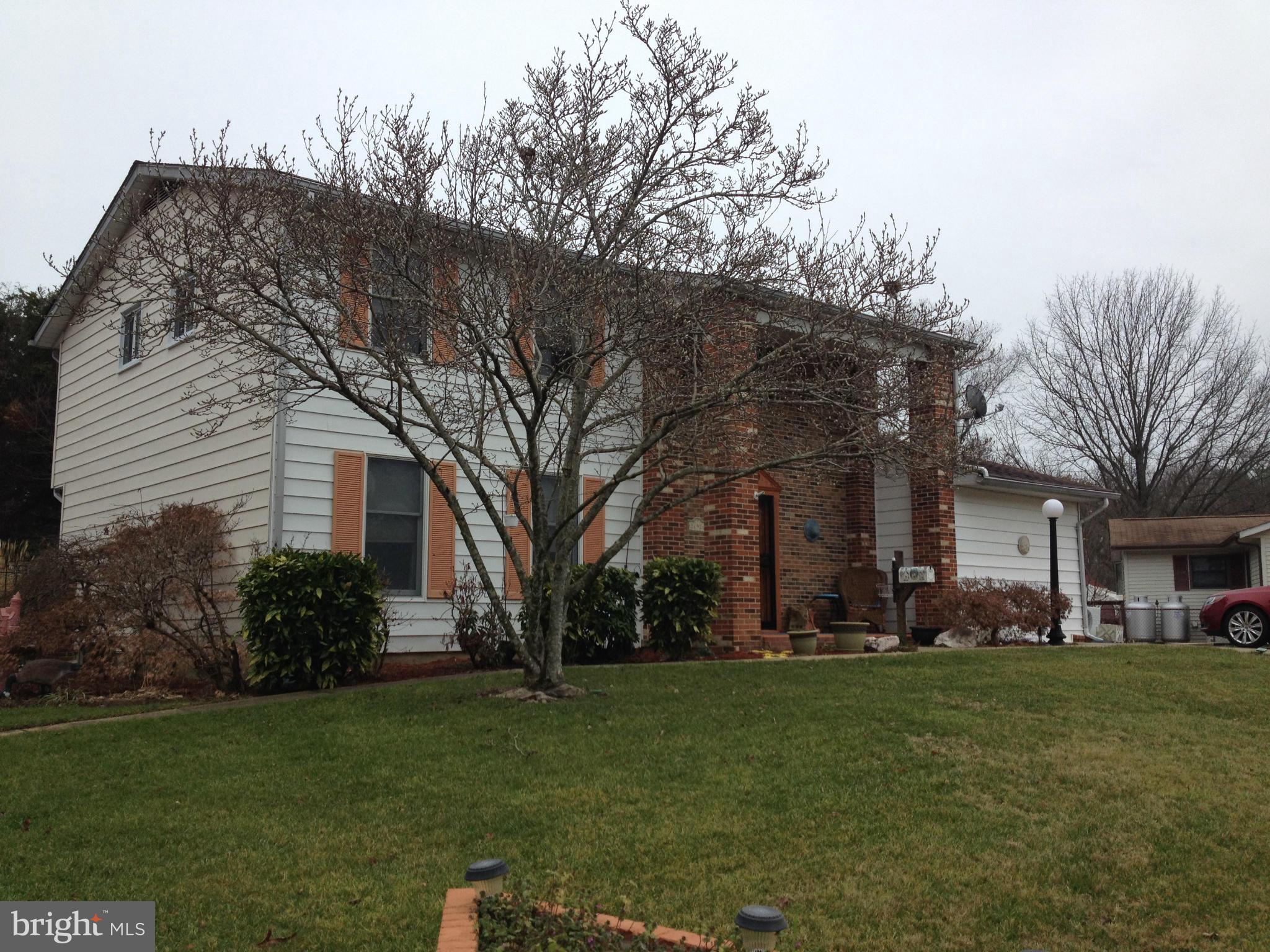 Huge colonial with lots of space for you to enjoy both inside and out. Home has four large bedrooms 2.5 bths, large living room, and dining room, office, plus huge detached workshop/carport/garage, inground pool, fully fenced backyard, with bbg area, and shed for storage. Estate sale, sold as-is.