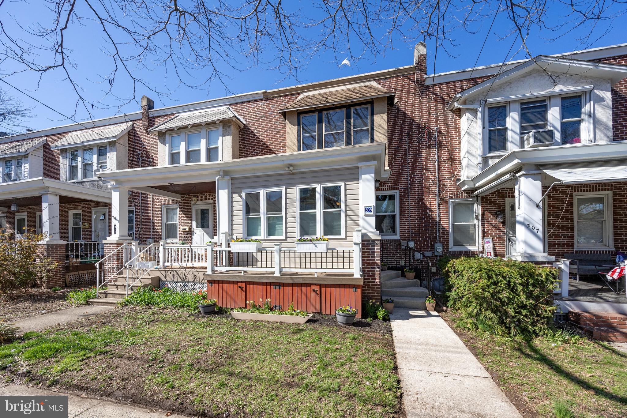 Welcome to this beautifully updated 3-bedroom, 1.5-bathroom brick row home located in the heart of Phoenixville, one of the area’s most desirable communities. As you step inside, you’ll immediately be impressed by the enclosed, heated front porch, featuring luxurious LVP flooring, recessed lighting, and an abundance of natural light. This welcoming space provides an ideal spot for relaxing or can serve as a home office, adding extra living space to the home. The spacious living room features built-in bookshelves on both sides of the ornamental fireplace, creating a cozy yet stylish atmosphere. The fully renovated kitchen is a true highlight, boasting stunning hickory wood floors, soft-close maple cabinetry, solid surface countertops, and stainless steel appliances. Pendant lighting above the island breakfast bar adds a modern touch, and the spacious layout offers plenty of room for a more formal dining table if preferred. Adjacent to the kitchen is a small room currently serving as a walk-in pantry, but it could easily function as a mudroom or extra storage area. From this room, “Trex” stairs lead to the private paver patio, fully fenced backyard, and breathtaking garden. The garden, recognized as a "Garden of Distinction" by the Pennsylvania Horticultural Society, is a true retreat, featuring lush shrubs, vibrant perennials, and colorful flowering bulbs, providing a peaceful oasis just outside your door. On the second floor, you’ll find the primary bedroom along with two additional bedrooms. The modern hall bath features a skylight, providing natural light to brighten the space. The partially finished lower level adds even more potential to this home, with a laundry area, convenient half bath, and abundant storage. This space can easily be transformed into a cozy family room, workshop, play area, or man cave. A cedar closet adds additional storage options, enhancing the functionality of this level. Step outside, and you’ll find even more to love about this property. The paver walkway leads to a handcrafted 16x10 shed that’s insulated, powered, and features recessed lighting and a covered drink bar area. Whether used as a hobby space, extra storage, or a retreat, this shed offers unique versatility. In front of the shed, there’s plenty of room for a fire pit and seating, perfect for enjoying evenings outdoors. The backyard is fully fenced, providing a private space for relaxation and entertaining, while the garden offers a stunning display of color throughout the seasons. The rear gate conveniently leads to an off-street parking spot, adding extra convenience to this already incredible home. Phoenixville is a vibrant, growing community with a rich history and a strong sense of local pride. This charming town offers a variety of shops, restaurants, and cafes, along with excellent schools and beautiful parks. Residents can enjoy small-town charm while being just a short drive from Philadelphia, making this location perfect for both relaxation and convenience. Whether you’re enjoying the Schuylkill River Trail, attending a local event, or simply relaxing in one of the town’s charming cafes, Phoenixville offers something for everyone. Don’t miss the opportunity to make this stunning home yours—schedule your private showing today! Check out the virtual tour link, here in the MLS. Showings begin Friday, 4/11.