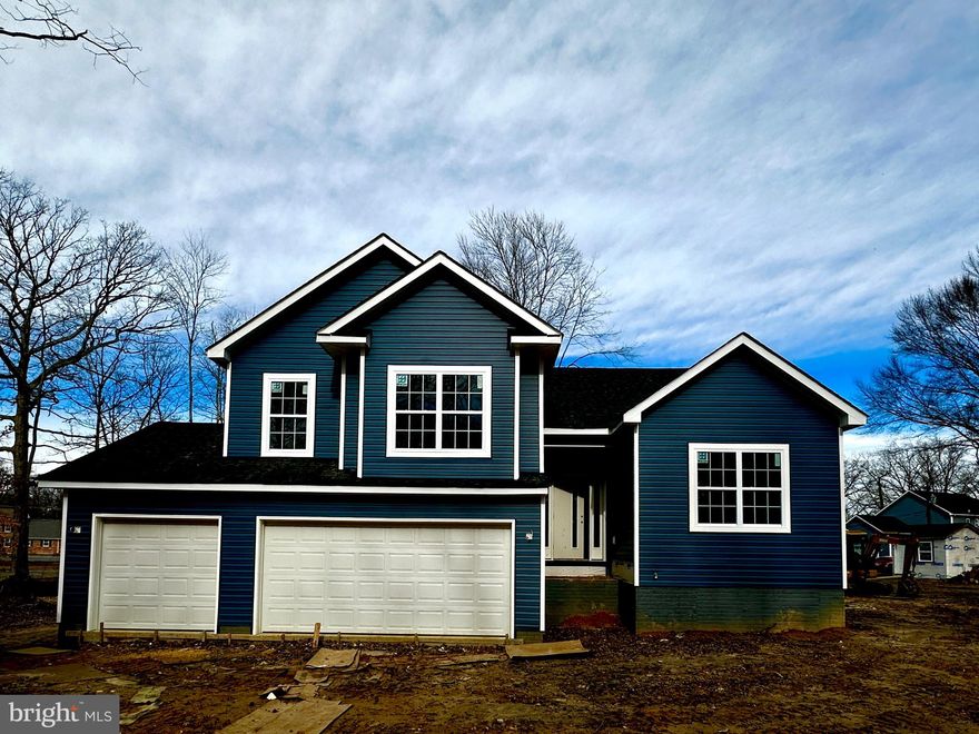 Absolutely Gorgeous custom home with 3 car garage. Kitchen with stainless steel appliances, granite, Island, pantry, recessed lights, and more!! Kitchen overlooks the magnificent family room with custom tiled wall fireplace. 4 Bedrooms and 3.5 baths, Primary bedroom offers primary bath with soaking tub, double vanities, custom tiled shower, and large walk-in closet with shelves. Outside includes a Deck and large patio plus upgraded siding.