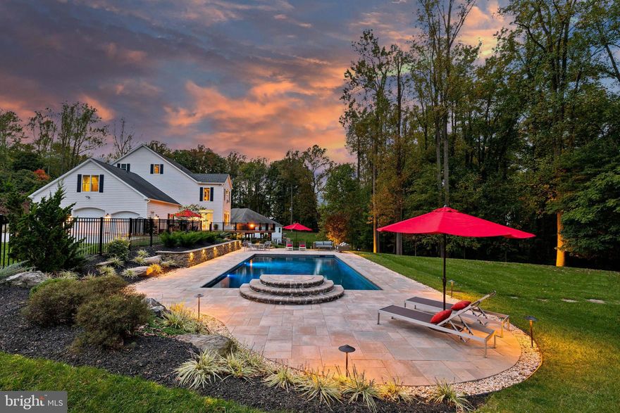 Live authentically. The quintessential modern farmhouse you’ve been waiting for. An incredibly private Monkton oasis on 5.83 acres surrounded by farmland. Step in and feel right at home. A Fresh palette with interiors by Folding Chair Designs. Open and airy layout with stunning kitchen as the anchor. Multi-tiered outdoor terrace beckons you out to glistening saltwater pool and firepit. Feel a sense of peace with woodland views in the distance. The ultimate spot for hosting guests all summer long. Step upstairs, or take the elevator, to retreat to your spacious primary suite. Second level also includes laundry, three additional bedrooms and two bathrooms. A surprise third floor makes for the perfect in-law suite or destination office. Transend downstairs to your fully finished walkout lower level ready to house all of your recreational and entertaining desires. A home designed to elevate your every day. Cultivate your existence. The art of uniting human and home.