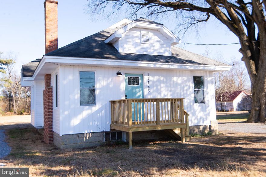 Priced to sell!!  Beautifully renovated 3-bedroom, 2-bath home offering modern updates and a peaceful setting.  Recent improvements include brand-new windows, all new stainless steel appliances, new HVAC system, new electrical panel, new flooring, new paint, and new carpeting throughout. The flexible floor plan features two bedrooms on the main level and a spacious loft-style third bedroom upstairs with a beautiful walk-in cedar closet, offering excellent storage.  The interior is enhanced with tasteful sea green accent tones, adding a fresh and inviting touch.  Enjoy serene views from the backyard, which backs up to Records Pond and mature trees, providing privacy and a natural backdrop.  Don't forget the full basement for additional storage.  Move-in ready and thoughtfully updated—this home is a must-see!