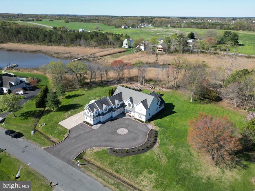 Welcome to 110 Kirwans Landing, Chester Maryland!  Tucked away on 1.5 acres in one of Kent Island's most sought after communities, this expansive home offers over 6,000 sq ft of living space, unmatched privacy, and refined coastal living.  Featuring 3 bedrooms, 2.5 bathrooms, a dedicated office and an impressive 5 car garage, there's room for everything - and everyone. Enjoy a private backyard oasis with a sparkling in ground pool, ideal for entertaining or simply unwinding in your own serene escape. A beautiful sunroom overlooks the lush grounds, filling the home with natural light and offering the perfect spot for morning coffee or afternoon reading. With water access just down the street and easy proximity to local restaurants, shopping and the Cross Island Trail, this home perfectly balances tranquility with convenience.  A rare opportunity to own a slice of the Eastern Shore lifestyle -- with room to grow, relax and play. Welcome Home!