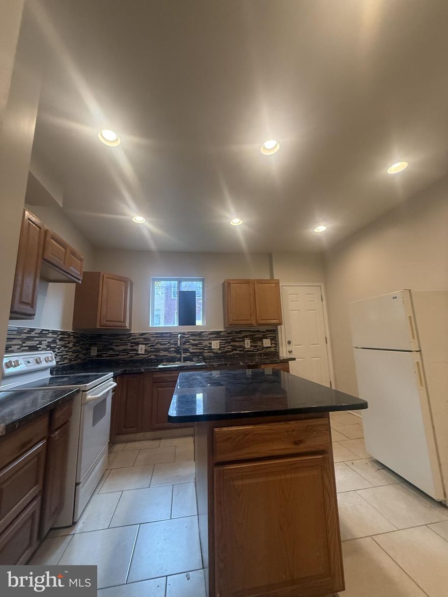 Beautifully designed New Flooring throughout and New Paint 
First floor has a Living area, dining area, an open kitchen layout and a half bathroom.
The second floor has 3 bedrooms each with a closet and a full Bathroom.
The basement is included and have high ceiling cemented floors
 
This is a nice size house and ready to move in on