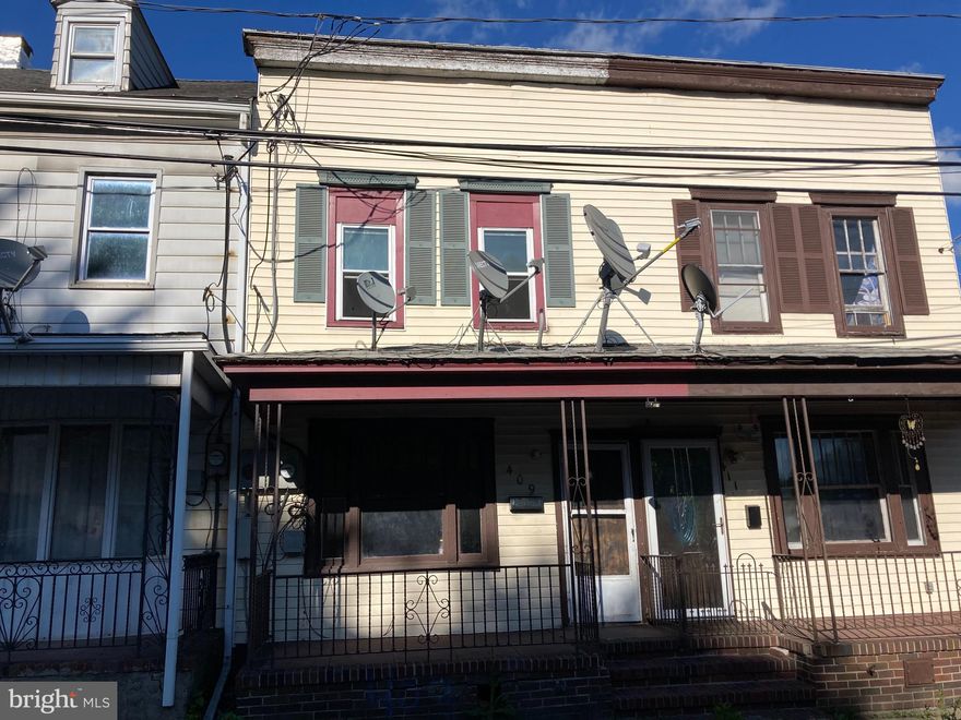 3 Bedroom 1 bath row fixer upper. Being sold as-is. Buyer responsible for borough inspection & clean out. Bring a flash light. No Electric service.