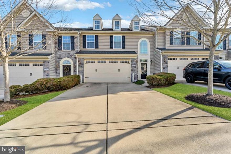 Nestled in the sought-after 55+ community of Waverly Woods West, this exquisite town-home offers a perfect blend of comfort, elegance, and serene living. Backing onto beautiful views of lush trees and a pond, this property invites you to relax and savor the beauty of nature. Step through the inviting foyer into an open-concept living space, flooded with natural light and enhanced by gleaming hardwood floors. The vaulted ceilings create an airy ambiance, while the formal dining room with a sparkling chandelier, sets the stage for memorable gatherings. 

The spacious living room flows into a charming sun-room, complete with a cozy fireplace, exterior access to beautifully landscaped surroundings, and a tranquil spot perfect for savoring morning coffee. The gourmet kitchen is a culinary delight, boasting granite countertops, rich cabinetry, stainless steel appliances, and a center island. For added convenience, the laundry is located on the main-level. 

The primary suite is located on the main level, featuring a walk-in closet and a luxurious en-suite bath with a dual-sink vanity and a walk-in shower with a built-in bench. Upstairs, a versatile loft offers endless possibilities for a home office, hobby space, or relaxation area. Two additional carpeted bedrooms, a full bath with an extended vanity, and an extra room await your creative touch. The expansive lower level is designed for both entertainment and functionality. Enjoy a recreation room, a den/bonus room, a full bathroom for guests, and ample storage space. 

Waverly Woods West offers a lifestyle of convenience and leisure. Residents enjoy access to a community pool, fitness center, scenic walking trails, and proximity to shopping, dining, and recreational facilities. Schedule your private showing today and experience the peaceful, elevated living this remarkable home and community provide. Don’t miss the opportunity to make this dream property your own!