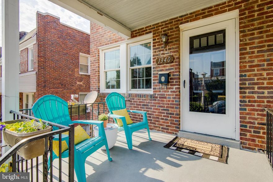 Amazing location right in Hampden! This end unit row home nestled on a quiet side street is filled with natural light and has been freshly painted for the new owners to enjoy. Spend afternoons on the great covered front porch, perfect for enjoying coffee while chatting with neighbors in the community. Enter into the light filled living room with a ceiling fan. Head through the living room and into the kitchen, which has stainless steel appliances, ample counter space, and room for a breakfast table. Upstairs you will find two nicely sized bedrooms with ceiling fans and loads of natural light as well as a full bathroom. The lower level could be used as a spacious family room or an additional bedroom and has a second full bathroom. Head outside from the lower level into a quiet backyard oasis! The fully fenced backyard features a deck perfect for enjoying a summertime meal and a yard with great light for gardening. The location of this home is convenient to all the shops and restaurants in Hampden and close by to Roosevelt Park. You are sure to love living on this beautiful street - come check it out before it's gone!