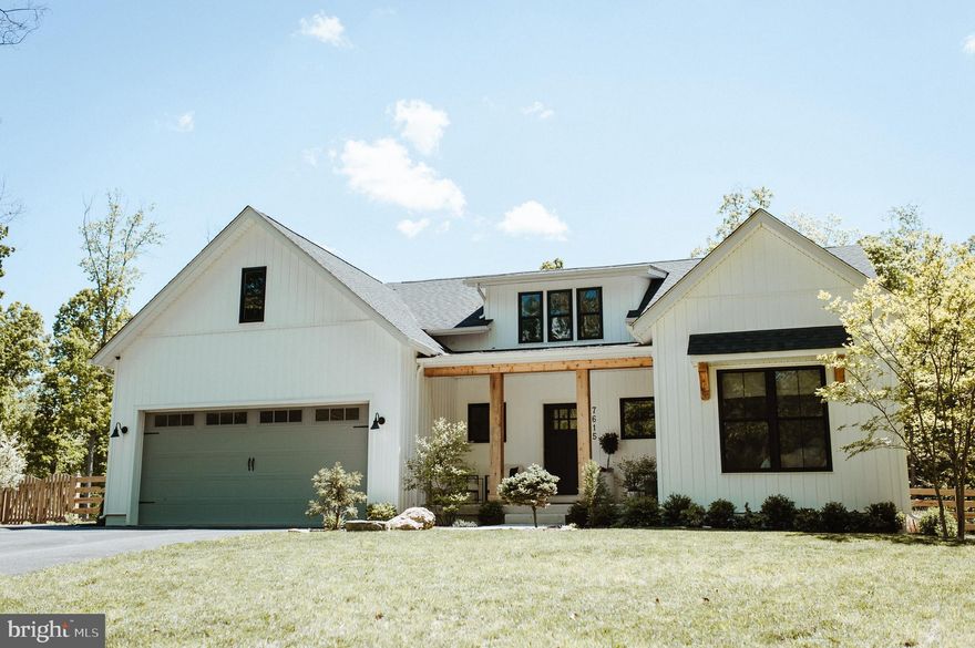 Restoration Hardware meets Pottery Barn when you walk into this modern farmhouse nestled on 3.38 acres of private, wooded land.  Enter through the foyer, designed to mimic an art gallery, and featured on Pottery Barns website itself!  Luxury kitchen presents a 5 seater island with quartz waterfall edges, a custom pantry barn door, and is open to the dining area and great room.  The 14 foot tall vaulted ceilings accented with white oak gable-bracket beams, along with the stone fireplace and black picture frame windows, elevate the look of the living room and offer a cozy place  to retire after a long day.  With the simple press of a button, your gas fireplace ignites.  Watch the sunset from your master bathroom while soaking in your large freestanding tub or enjoy it with a glass of local wine on the comfort of your front porch.  Finished basement is perfect for family movie nights, play dates, or a home office space.  Additional full bathroom nearly complete in basement.  Back of lot is protected with forest conservation and location of home is perfectly situated among the beautiful wineries and breweries of East Frederick County.  Do not miss your opportunity to view this truly spectacular custom home.