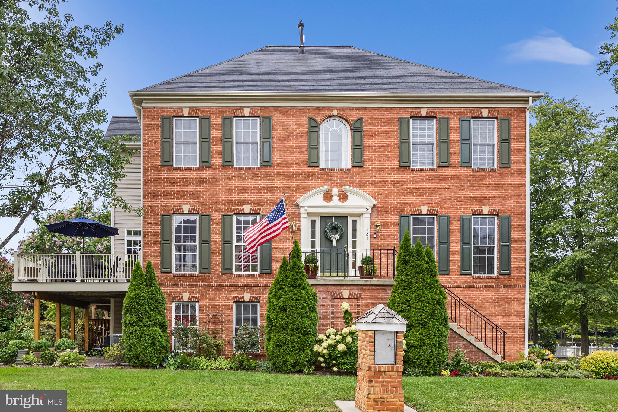 With a standout location right across from favorite Edgewater restaurant and shops (like Black Market Bakers, Always Ice Cream & Timber Pizza!), this end-unit townhome combines convenience with unexpected space and style. Inside, the main level impresses with hardwood flooring, high ceilings, rich double crown molding, and wraparound windows that fill the living room with natural light. The dining area features chair rail detailing, and the kitchen offers abundant cabinetry, a pantry, eat-in table space and easy flow to the deck for outdoor dining. A coat closet and powder room are tucked discreetly on the main level.
Upstairs, the primary suite is a true retreat with a large walk-in closet, a flexible sitting or office area, and a spacious en-suite bathroom complete with a separate soaking tub and walk-in shower. Down the hall, you’ll find two additional spacious bedrooms and a full bathroom, offering great separation of space and comfort for guests or family.
The fully finished walk-out lower level features large windows, a gas fireplace, and a half bath—making it a great retreat, recreation space, or guest level. It opens to a private patio bordered by mature landscaping.Additional highlights of the home include an oversized two-car garage with extra storage, updated systems - new HVAC (2019), roof (2020), water heater (2019) and recent improvements including a refreshed deck, updated lighting, and interior paint.
As part of South River Colony, you’ll also enjoy access to two outdoor pools, trails, tennis and pickleball courts, playgrounds, and more, all just a short drive to Annapolis and within easy reach of D.C. and Baltimore!
