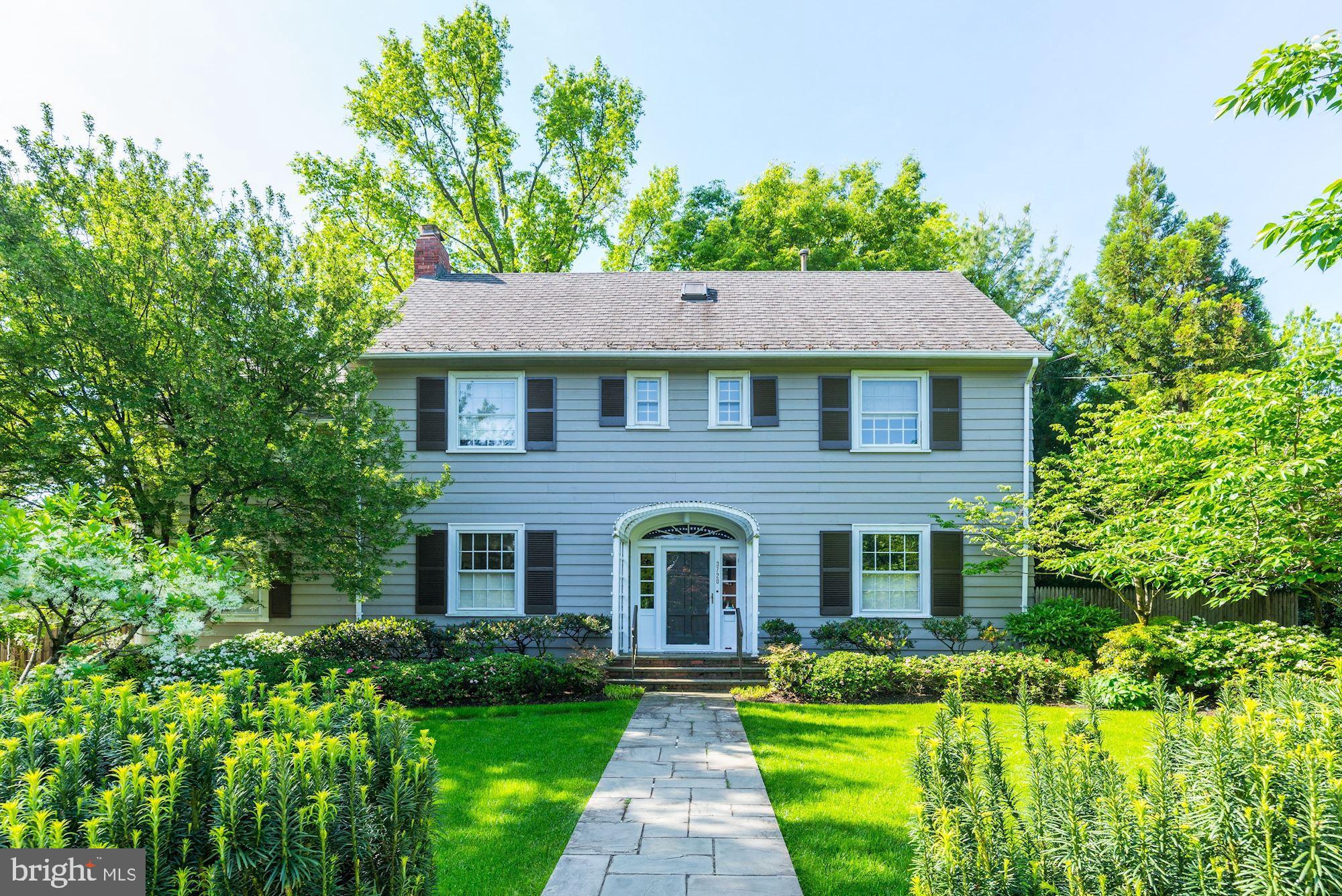 Quintessential Chevy Chase Village! Classic 1923 Colonial on flat 12,200SF+ lot with extensive mature landscaping & grounds. Center Hall opens into gracious floorplan with 9? ceilings, elegant principal rooms, eat-in Kitchen, & main level Primary Suite which all walk-out to level terrace overlooking south facing garden. Upper levels include 5 bedrooms & 3 full bathrooms ? including second level Primary Suite. Lower level is primed for additional living space. Private driveway leads to 2-car garage.