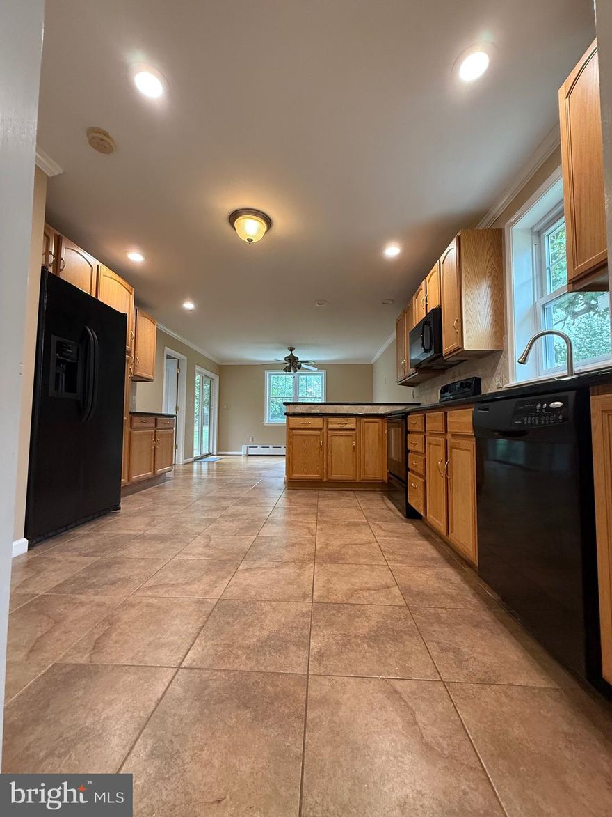 🚨NEW PRICE ALERT 🚨 Charming bungalow in Springfield Township with a HUGE yard! No sharing to worry about with a single, private concrete driveway that accommodates up to four cars, along with additional parking directly in front of your home.  MOVE IN READY. Investors can also appreciate the home as neighboring properties have been expanded. Don’t miss your chance to be part of this growing community! Nothing  to do but unpack in this 3 br & 1.5 bathroom home. The backyard is fenced away from both neighbors with a covered deck & a NEW concrete patio. A shed built to mimic a mini version of the home. New roof on original home ( five years). Addition built in 2008. Classic crown molding & chair rail. Granite and marble throughout the bathroom and  kitchen. Concrete walkways have custom colored slate incorporated leading you to a covered front porch. Everything close by,  schools, shopping, the mall, public transportation, parks, courts, great food establishments. Quick transit to the city, easy access to I-95 and 476.  Why wait, schedule a showing NOW!  (Motivated seller. Possible seller assist available with quick settlement)