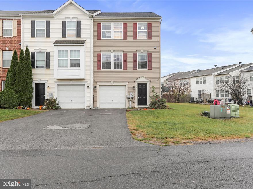 Welcome to this stunning 3-level end townhouse that boasts 2400 square feet of luxurious living space! This beautiful home features a second kitchen, main level laundry for your convenience, and an additional laundry hookup in the basement. The main level offers an inviting open floor plan, perfect for entertaining friends and family. Enjoy the added space and natural light with a 3-story bump out that provides extra room for relaxation and creativity. Step outside to your private deck and patio, ideal for enjoying the outdoors and hosting gatherings. New roof installed Sept 2024.  Seller is providing a 2-10 Home Warranty with acceptable offer. Don't miss the opportunity to make this exceptional property your new Home!