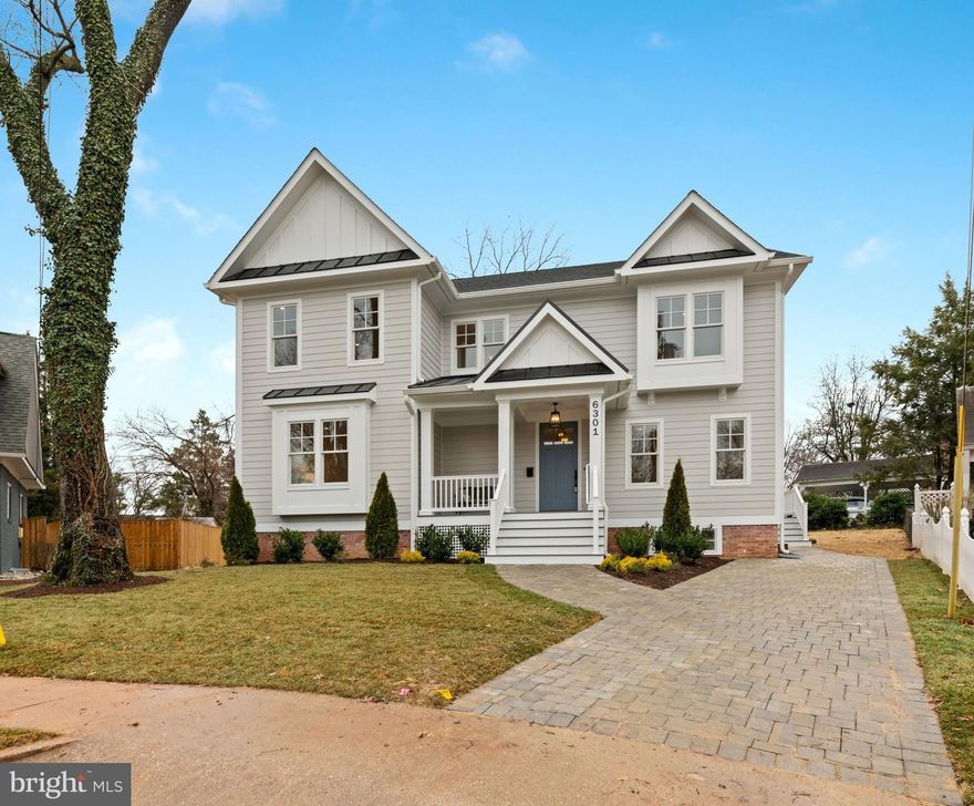 ** The Arlington Group,  in collaboration with Spring Street Development,   has perfected the pop-top by elevating a classic Arlington rambler with 9 foot ceilings on the lower, main, and upper levels of the home **This completely re-built and renovated home features a kitchen with crisp white cabinets, quartz tops, and stainless appliances flowing into a family room with coffered ceiling and gas fireplace.**Light flows into the home from Andersen windows which provide views of the large, flat rear yard.**The traditional dining room offers flexible space while the den in an deal home office or playroom or guest space.**A full bath adjoins the den adding to its versatility.**Mudroom entry from the driveway directly into the kitchen -- so convenient!**Upstairs the primary bedroom has a large walk in, fitted closet, private bath with double vanity and a tub to soak away the cares of the day.**An en suite bathroom serves the second bedroom and a shared bathroom is between the third and fourth bedrooms.**The laundry is on this level along with linen storage.**The light filled lower level offers a fifth bedroom, full bath -- perfect for an in law, au pair, guest, or distance learning student.**The rec room provides space for media, exercise, and play.**Stroll to East Falls Church Metro, Tuckahoe Park and Playground, W&OD bike trail,  and Stewart Park.**Conveniently located between Westover Village's library, shops, restaurants, and Sunday's farmer's market and Lee-Harrison Center with two groceries, restaurants, shops and services.**Enjoy the independent restaurants along Lee Highway -- District Taco, Sloppy Mamas, Maya Bistro, A Modo Mio, Arlington Kabob -- and the "soon to open" Northside Social!***