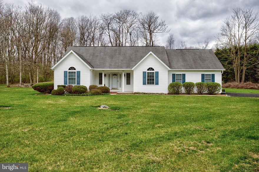 What a Great House. This house sits on an Open 2 Acres with a little bit of woods. Come enjoy  open floor plan and single level living. Owner has meticulously maintained this house. Walk into an open foyer with hard wood floors. Both Bedrooms on this side of house have carpet and  share a nice sized bathroom. Then enjoy your Huge Great  room to entertain. It has been appointed with  Brazilian Hardwood and fireplace with gas logs. Nice large, sunny kitchen with breakfast bar, table space, Stainless Steel Appliances,  and maple cabinets. Primary suite opens to patio to backyard to enjoy morning coffee or see the about wildlife. Primary Bathroom  has a garden tub and a walk-in shower. Property is  convenient  to I-81, Winchester, Martinsburg  Marc train and Commuter Routes.