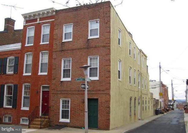 Fabulous Fed Hill apt in AMAZING LOCATION. Short walk to Cross St Market, Riverside Park, Harbor, restaurants, bars, shops & bus line. First level has hardwoods, open layout with living rm area in front and eat in updated kitchen in rear. Second level has bedroom wand bath. W/D in unit. This is a MUST SEE! Option for some storage in rear outbuilding. No smoking. Pets will be considered.