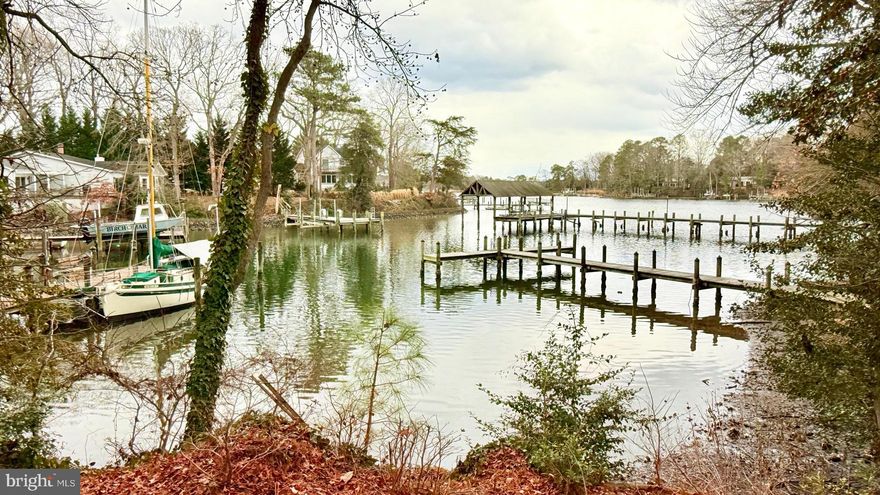 Waterfront Home with Local History on Lucas Cove

Own a rare piece of waterfront property rich in local and family history. This charming home, lovingly maintained by a military couple who raised five children here, sits on a deep, protected cove just minutes from the St. Mary’s River and the Potomac River.

Enjoy all the Chesapeake lifestyle offers — crabbing, fishing, and swimming from your private pier, or setting out by sail or power boat to nearby waterfront restaurants. Unwind with peaceful sunset views across the water in a setting that feels worlds away, yet close to everything.

This 3-bedroom home features hardwood floors throughout and a cozy brick fireplace. An unfinished upper level (41' x 10') offers potential for additional living space or a creative studio. The double-size lot includes two outbuildings: a garden shed and a workshop with electricity. You’ll also discover a unique piece of local heritage — a partially underground ice house that could make a perfect wine cellar or tasting room.

Conveniently located near St. Mary’s College, NESEA, and the Patuxent River Naval Air Station, this property combines timeless charm, history, and waterfront living in one special place.