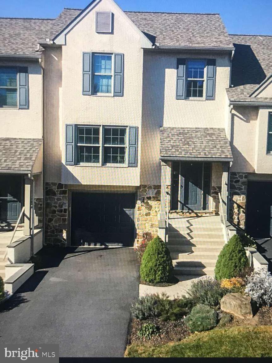 Move-in ready townhome in picturesque Summerfield at Elverson. Located in the northwestern corner of beautiful Chester County. Two bedrooms with two and a half baths and a large finished basement with attached garage. Open first floor plan with vaulted ceilings (in the kitchen and living room area) and quartz countertops with tile backsplash. The first floor opens to a large deck with scenic views. The primary suite is located on the first floor, with a walk in closet and bathroom. The first floor also includes a powder room and laundry. The second floor has a large bedroom, a full bathroom, an office and a loft. The attached one car garage has entry into the lower level. The home Includes ample parking for guests in the visitor parking area, located in the front.
Plenty of updates throughout, including: 2026: Interior of house painted. 2025: Deck sealed and painted, All stucco professionally cleaned, Stucco around front steps and dividers between driveways painted. 2024: First floor full bath completely remodeled, New driveway, New garage door, Garage door opener replaced. 2023: New roof, New hot water heater, Outside condenser unit replaced. 2019: New recessed lighting, Floors sanded and re-stained, Kitchen remodeled, Half bath remodeled, New carpet installed on 1st and 2nd floors.

The HOA fee is only $125 a month and includes lawn care and snow removal to your garage door. Convenience, Low maintenance and Affordable. A Walmart Plaza and the turnpike exchange are only a few minutes west in Morgantown with Lancaster County only 15 minutes away. Make this home yours in this friendly community with open spaces, beautiful nature throughout and horse pastures.