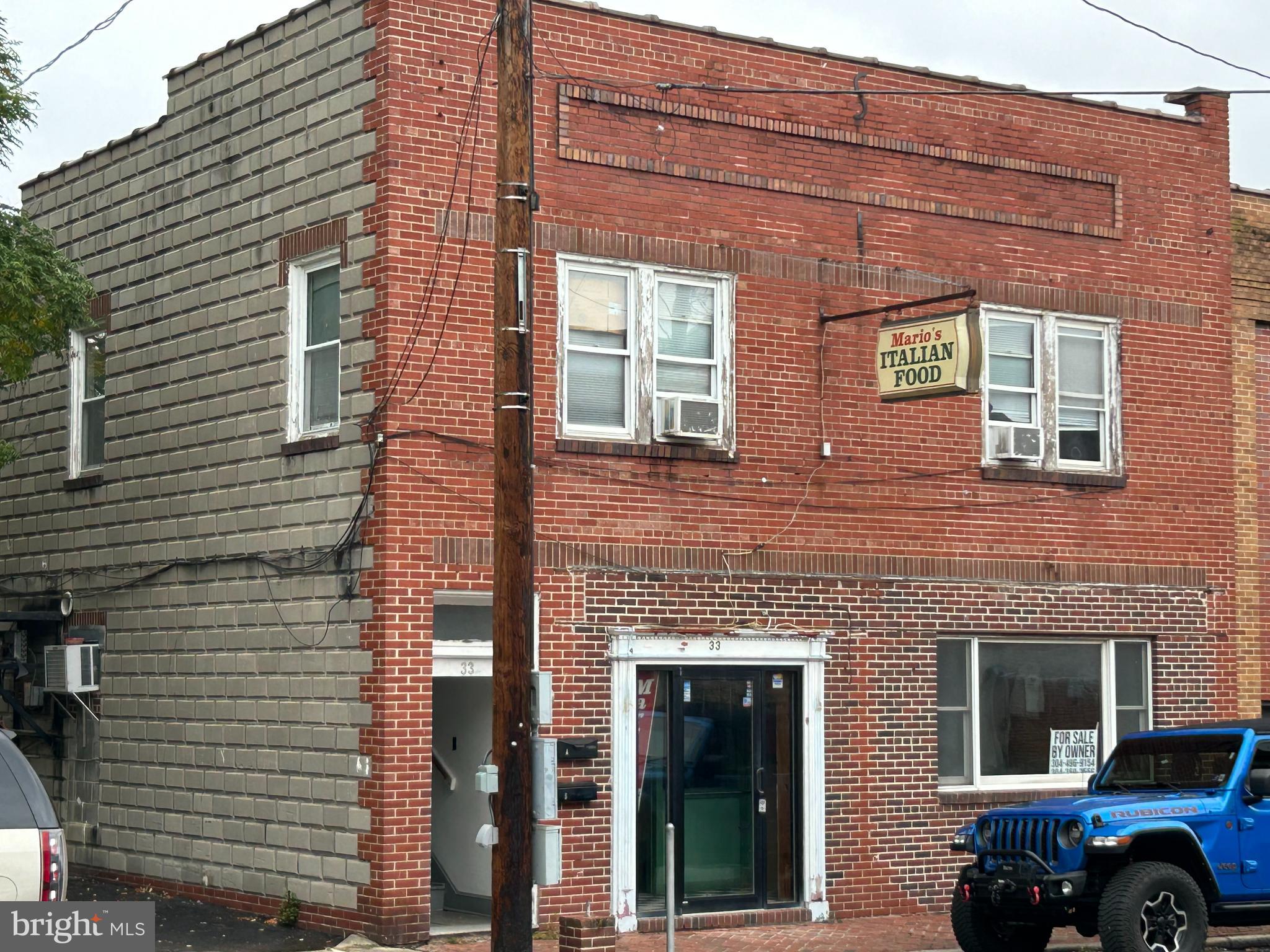 Attention Investors Opportunity is knocking 2 unit duplex with commercial space . Former restaurant with a great location in the heart of Romney .Lots of traffic located next to city park and across from the municipal building 1 one bedroom and 1 two bedroom apartments have been generating over $1600 per month income .You could possibly cover the monthly payment just with that, and the commercial space would be in addition to that.Make plans to see this one today,