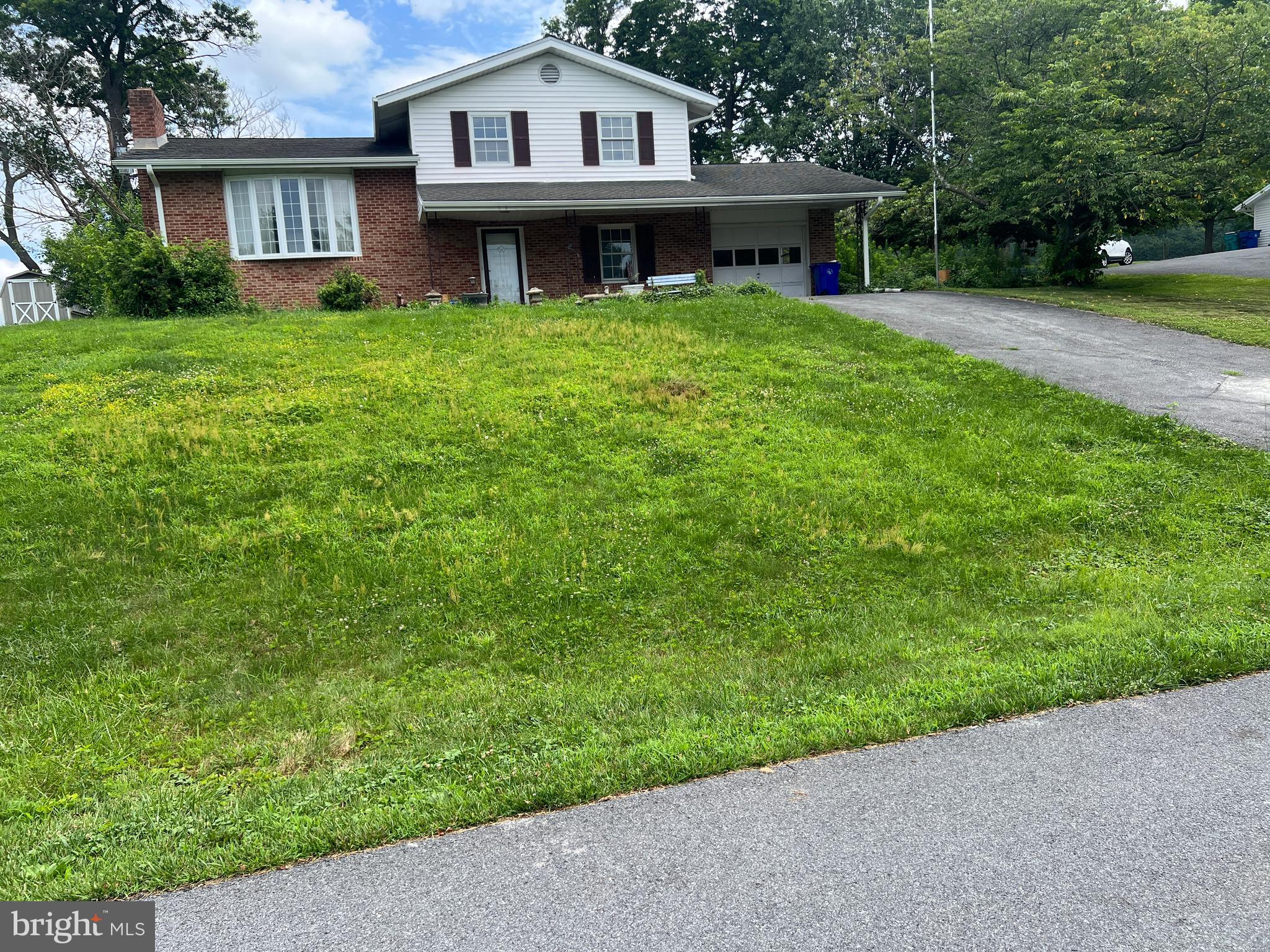 Real Estate Auction Property – August 7th, 4pm sharp onsite. The list price does not represent the opening or final bid. List price is a guide only. Seller has the right to refuse bid. A $5,000 non-refundable deposit will be due in the form of CASH OR CERTIFIED CHECK by the winning bidder at the conclusion of the auction. THIS IS AN ESTATE PROPERTY. THIS IS NOT A FORCLOSURE.
This split level, four bedroom, two and a half bath home sits on .31 acres in highly sought after Middletown, MD. Backs to farm land, has one car attached garage, solar panels on the roof, and has a rough-in for another bathroom in the basement. All bedrooms have hardwood under carpet, unfinished basement has walkout to Bilko doors. Just needs TLC. DON’T MISS THIS ONE! AGENTS EARN on our Auctions, Contact selling agent for the Broker Participation Agreement. THIS IS NOT A FORECLOSURE! Selling as is, no negotiations or contingencies. Lic. inspections fine at buyer cost pre-auction for info purposes only. Financing property fine. Close within 45 days. Property subject to an 8% Buyer's Premium. Non represented buyers attend open house or call for showing.
