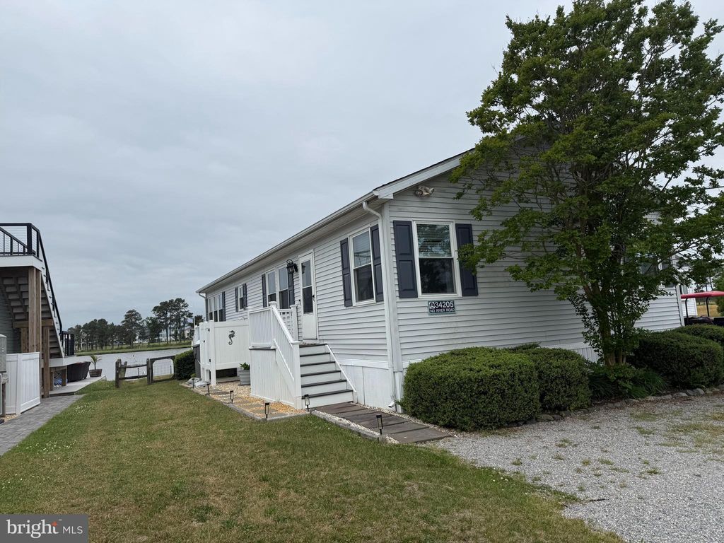 Photo of 34205 River Road #143, MILLSBORO, DE 19966 (MLS # DESU2112230)